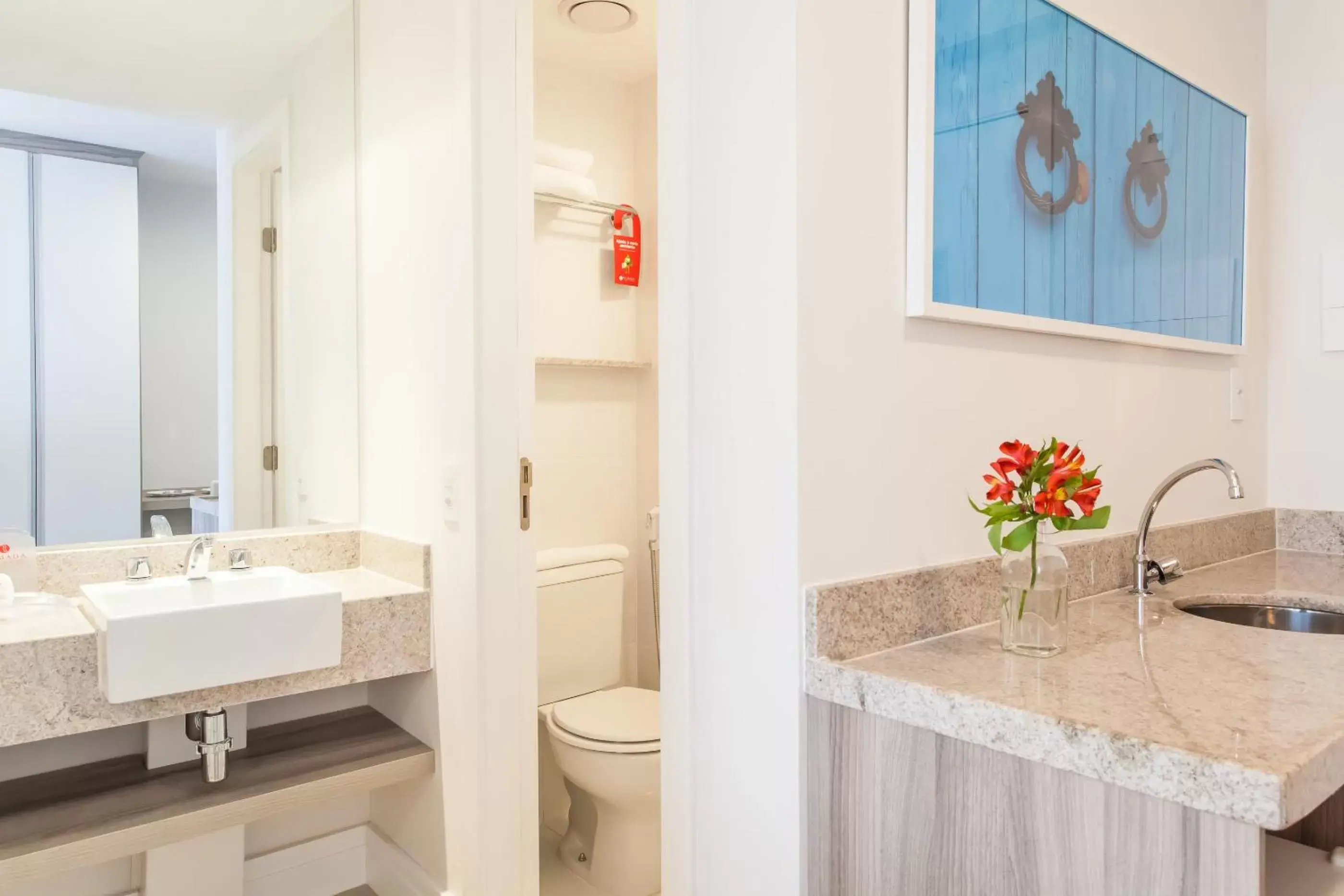 Bathroom in Ramada Hotel & Suites Campos Pelinca