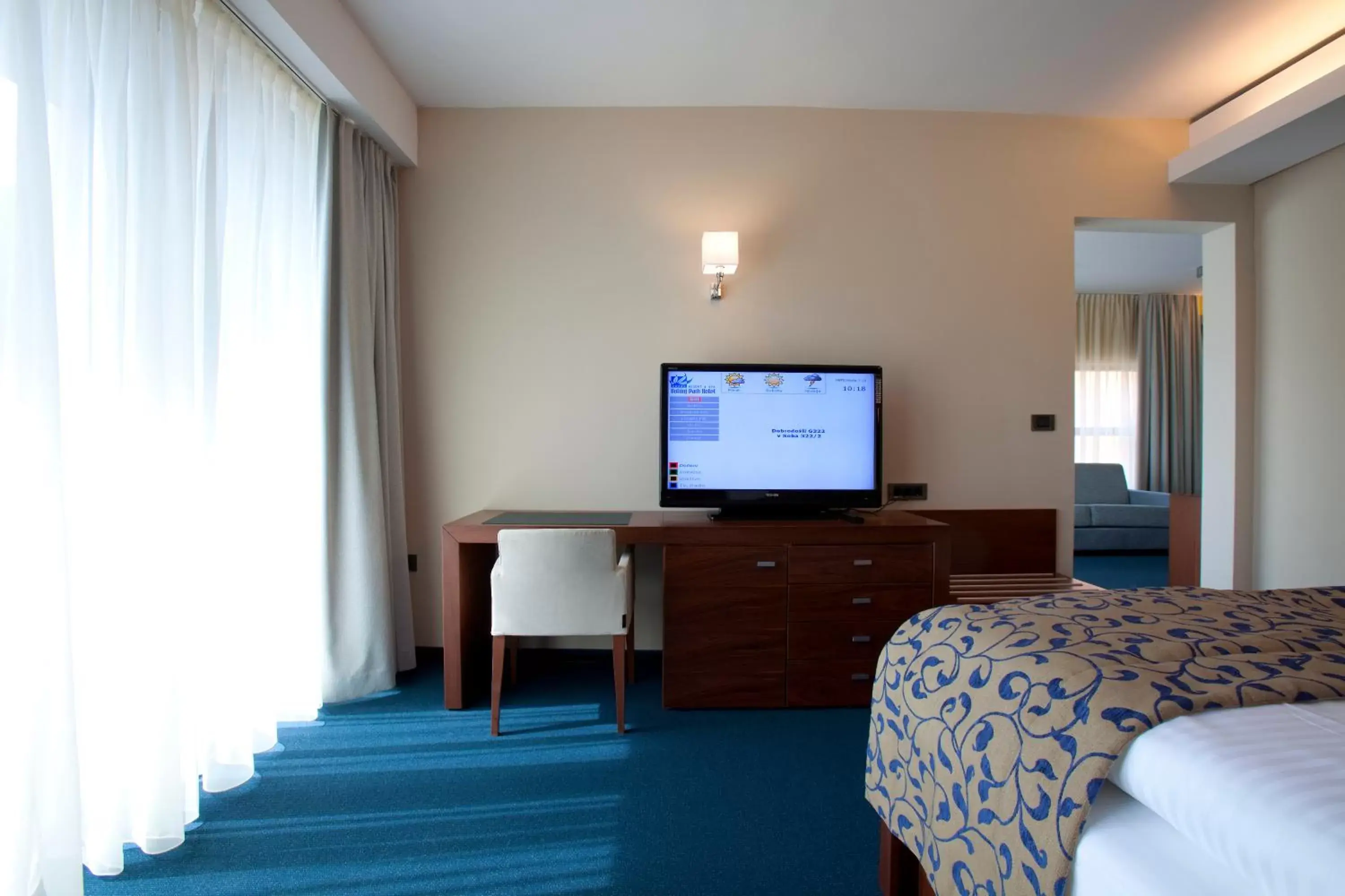 Bed, TV/Entertainment Center in Bohinj Eco Hotel