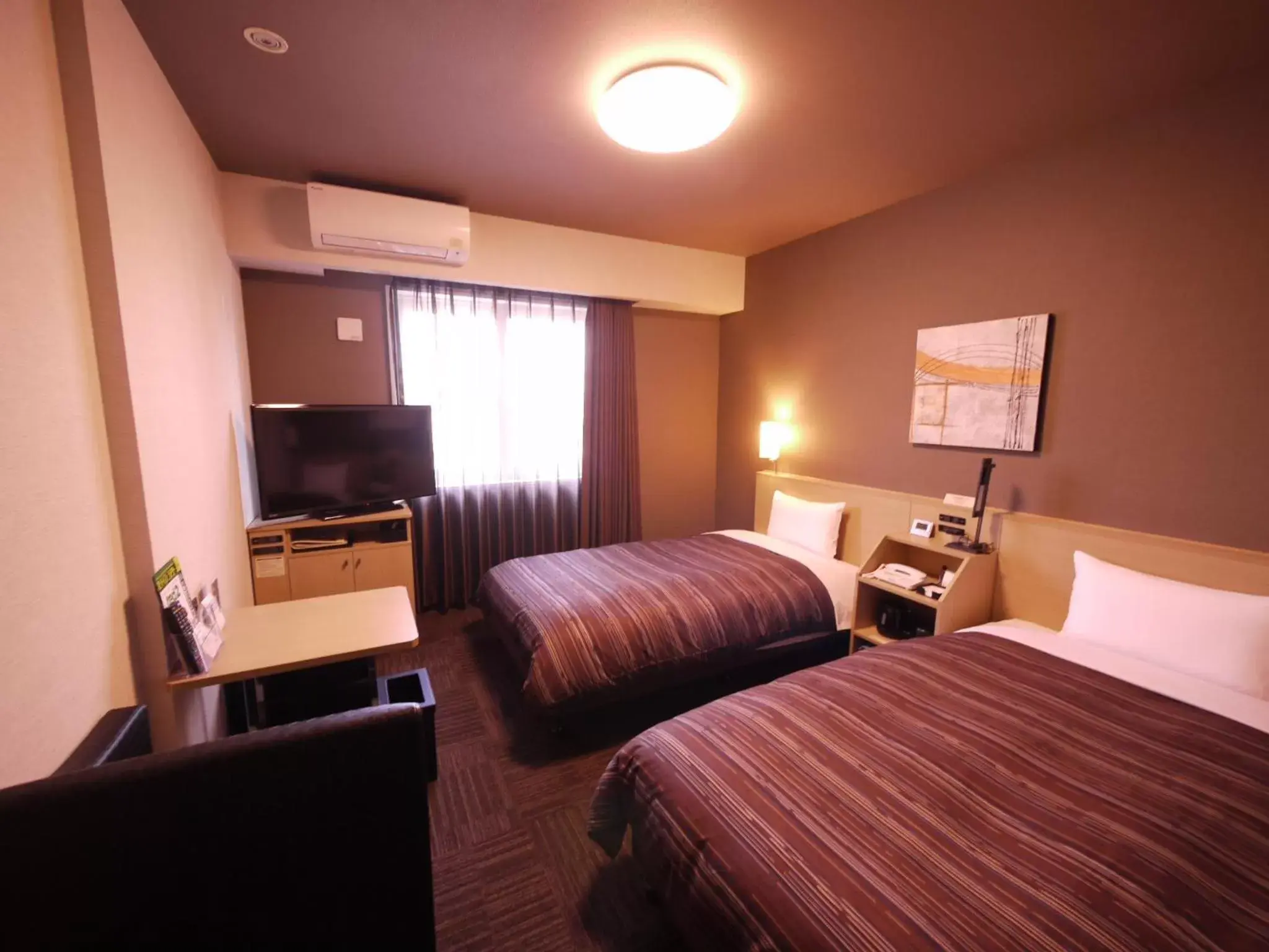 Photo of the whole room, Bed in Route Inn Grantia Komatsu Airport