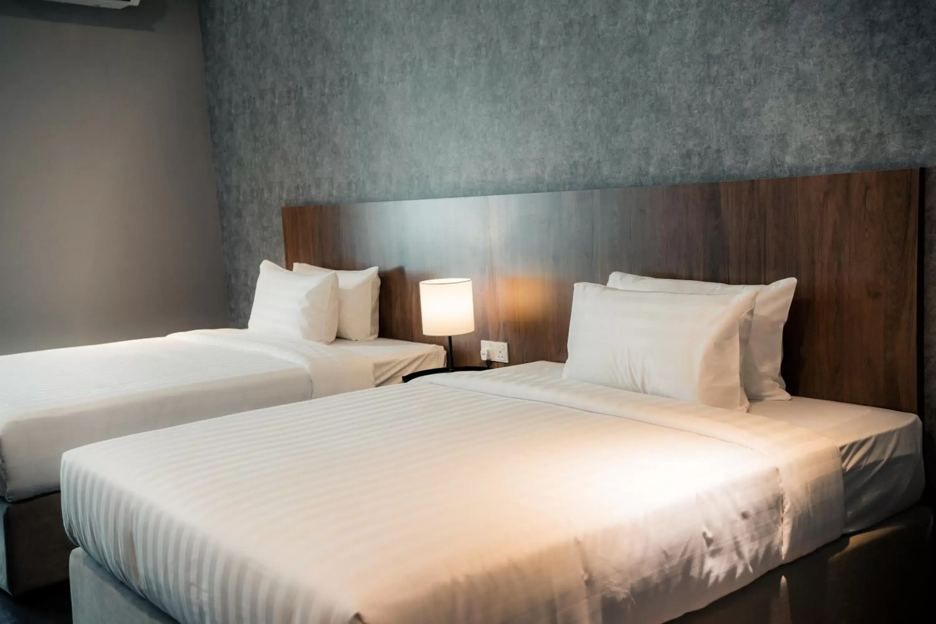 Bed in Le'venue Hotel