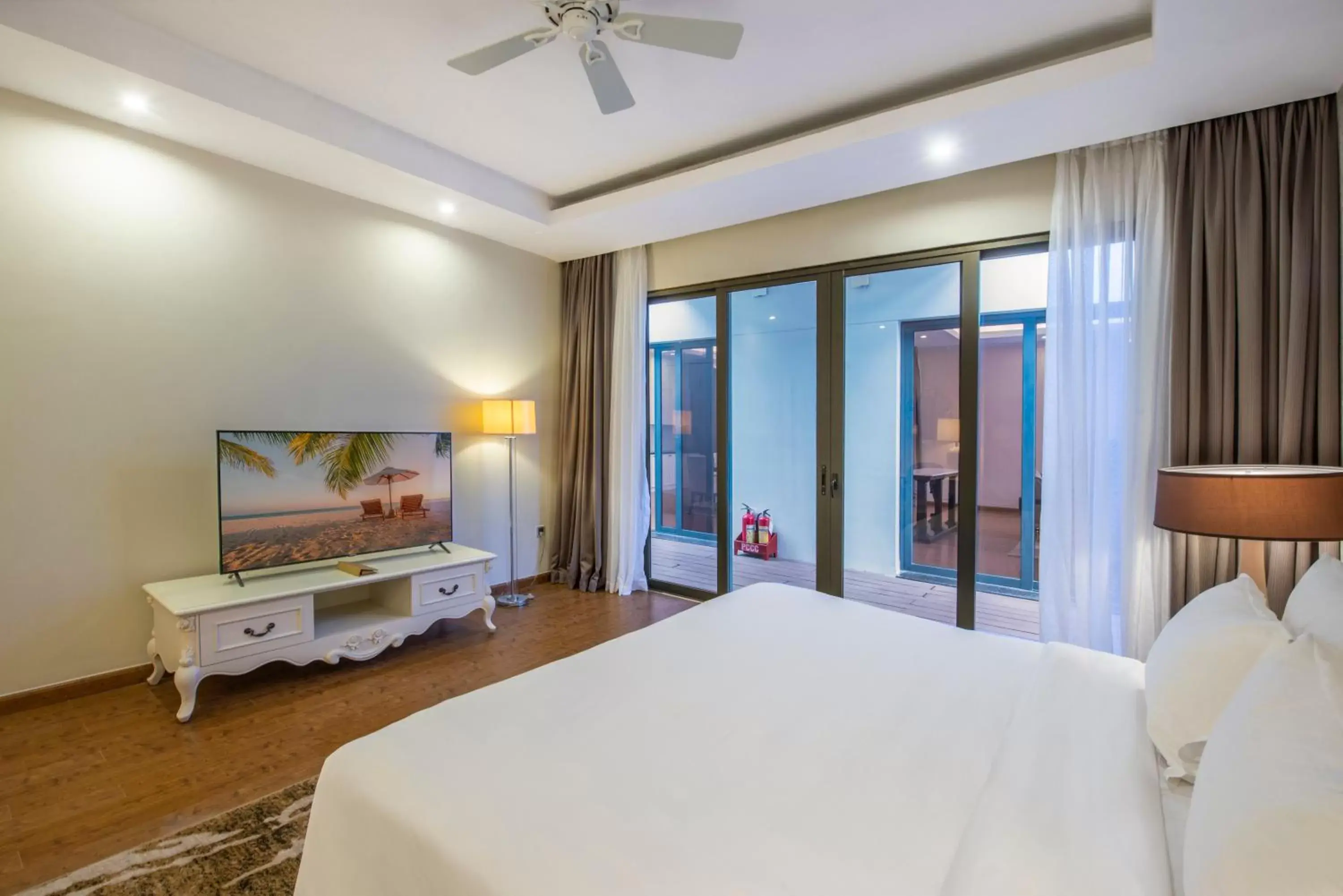 Bedroom, TV/Entertainment Center in Vinpearl Resort & Spa Nha Trang Bay