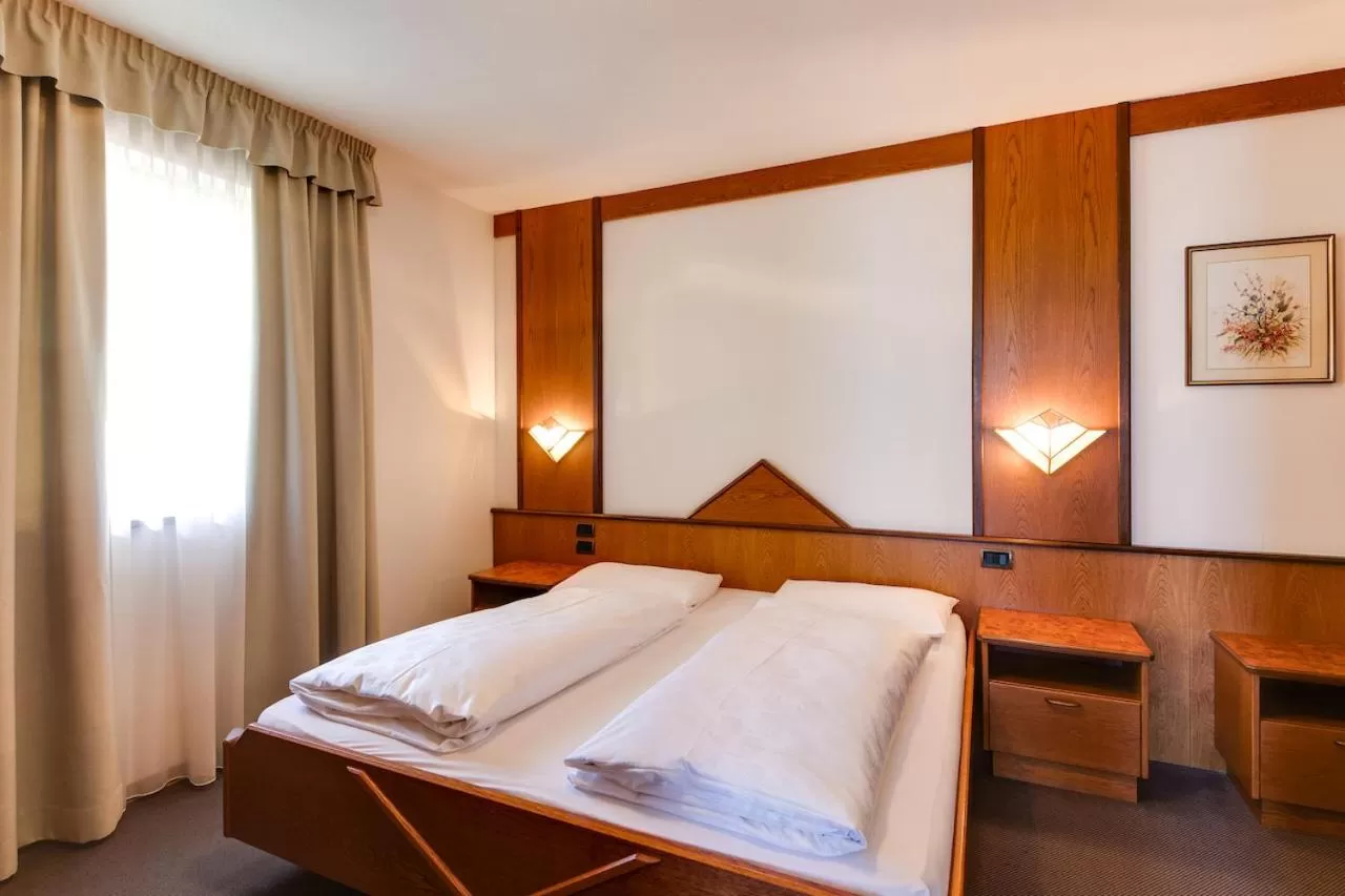 Bedroom, Bed in Smy Koflerhof Wellness & Spa Dolomiti