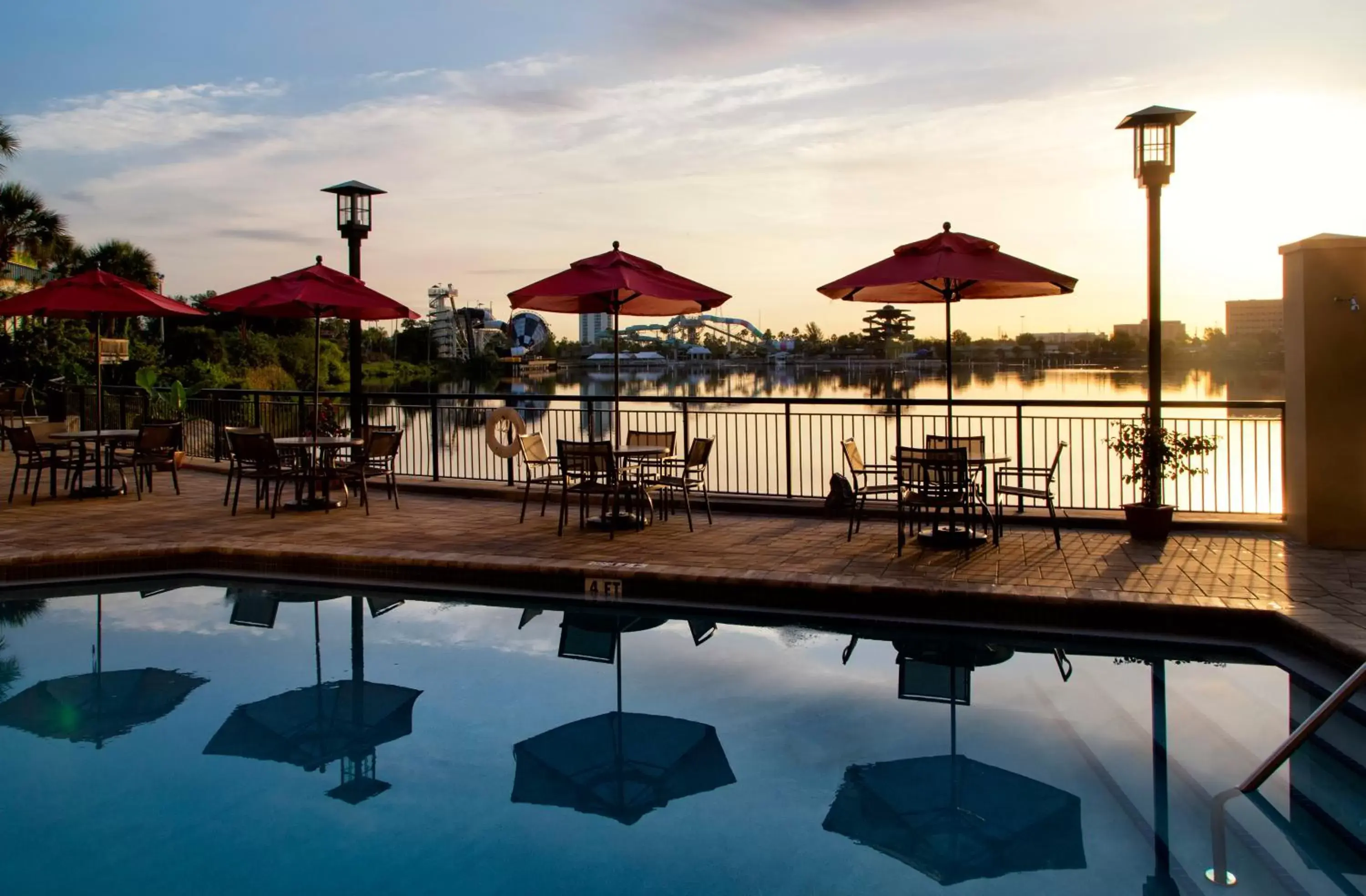 Lake view, Swimming Pool in Ramada Suites By Wyndham Orlando International Drive
