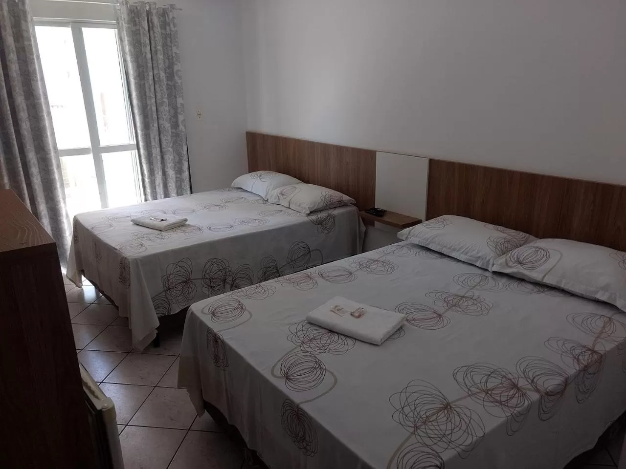 Bed in Pousada Terra do Sol