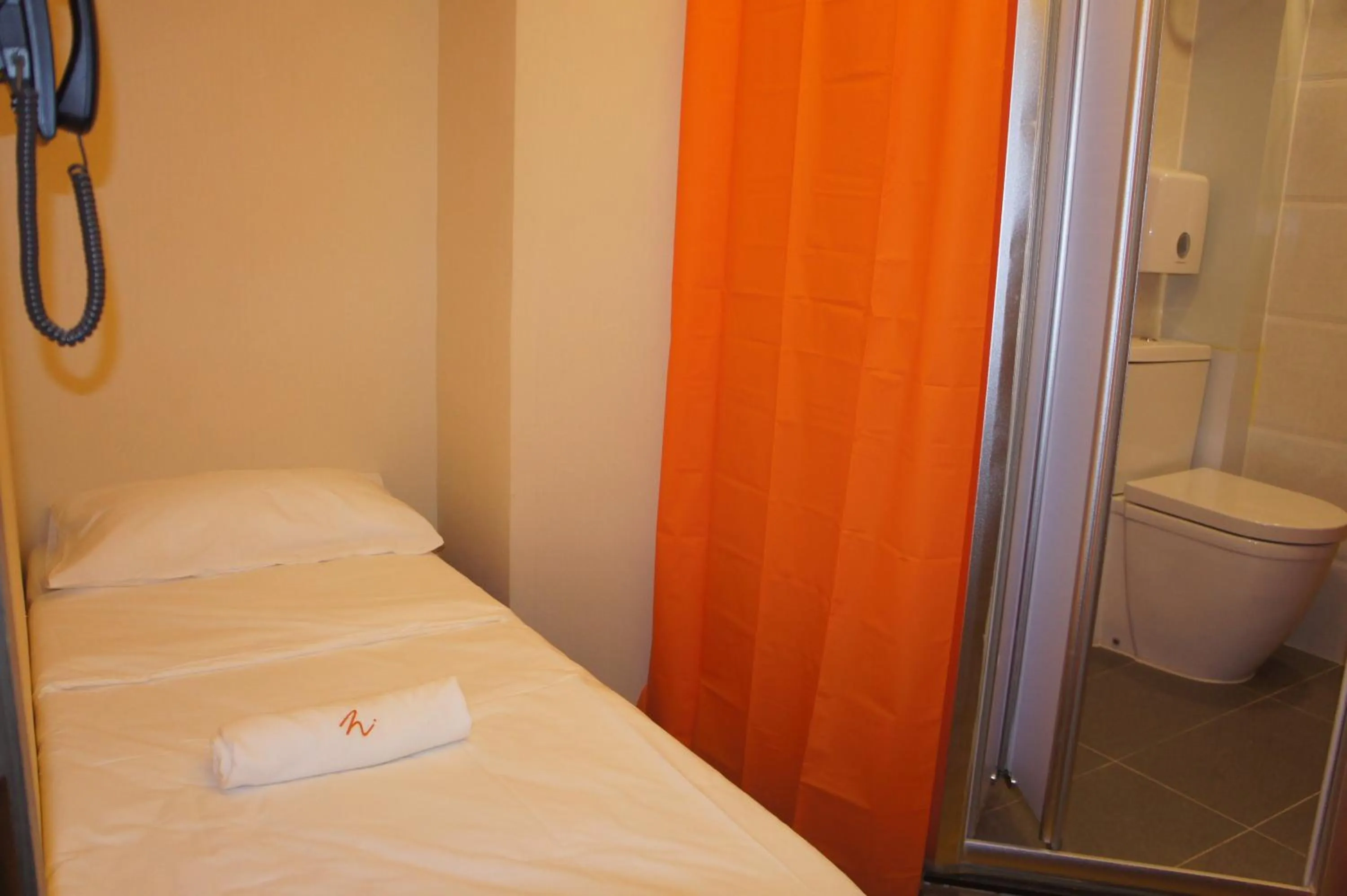 Bed in Homy Inn North Point