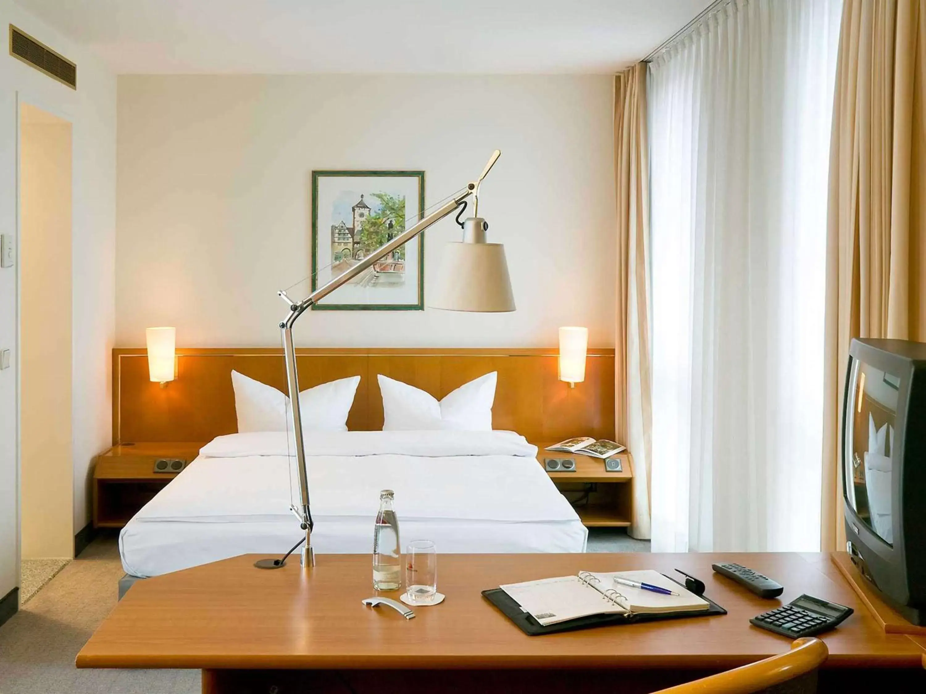 Photo of the whole room, Bed in Novotel Freiburg am Konzerthaus