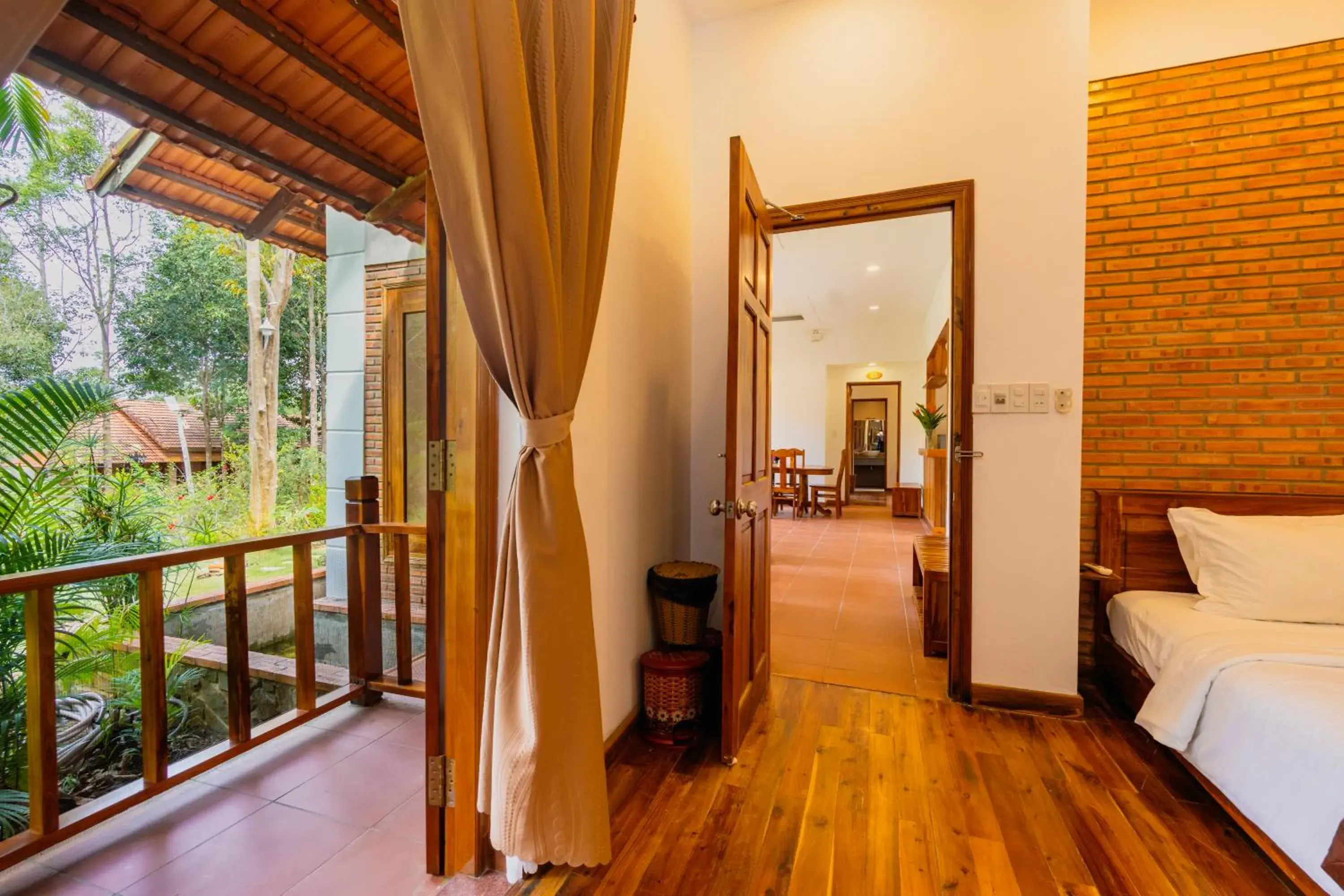 Bedroom, Seating Area in The Garden House Phu Quoc Resort