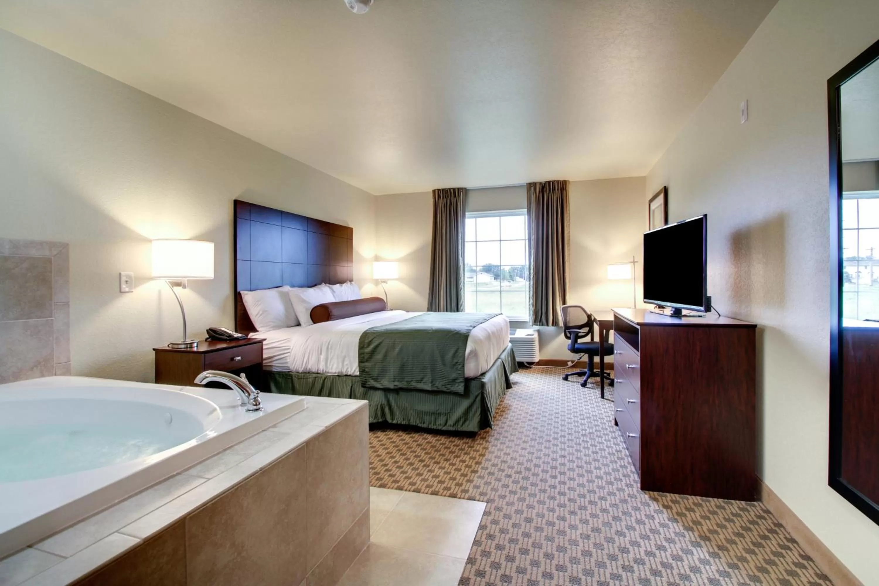 Photo of the whole room, Bed in Cobblestone Inn & Suites - Schuyler