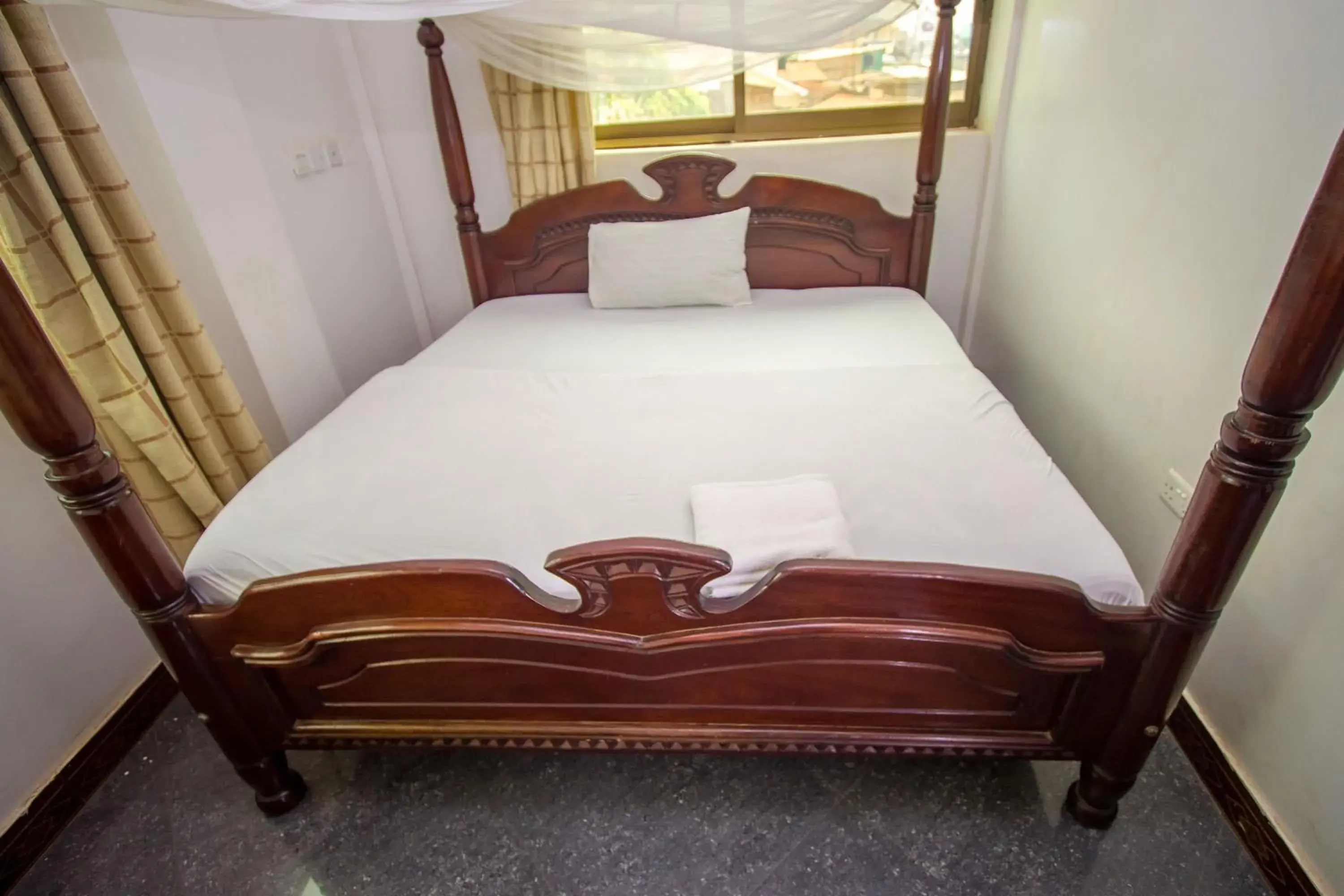 Bed in Minister's Village Hotel