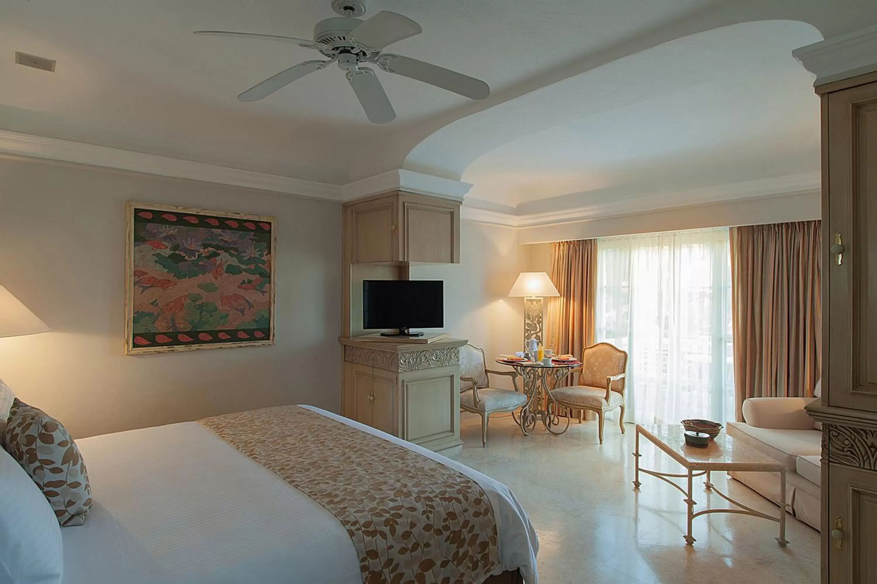 Photo of the whole room, TV/Entertainment Center in Grand Isla Navidad Golf & Spa Resort with Marina