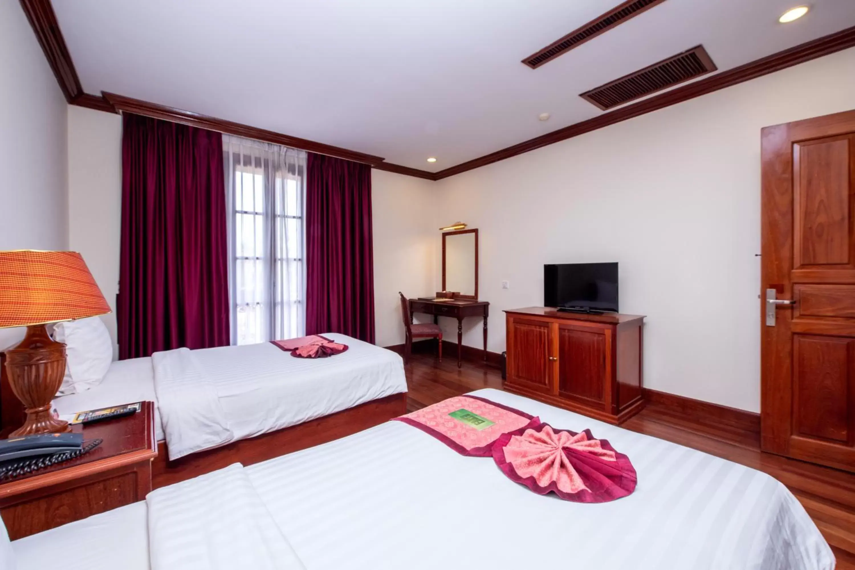 Bed in Steung Siemreap Hotel