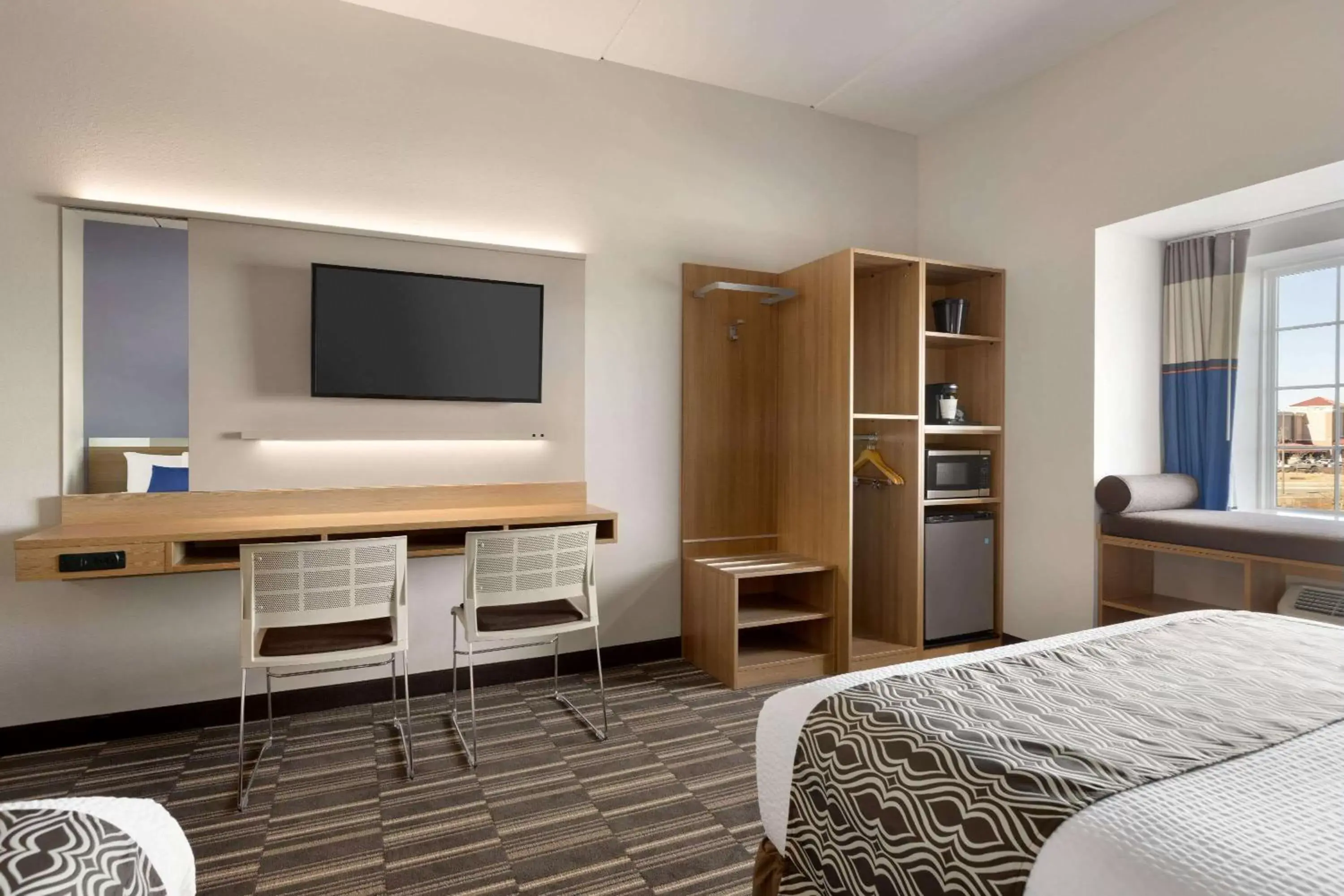 Photo of the whole room, TV/Entertainment Center in Microtel Inn & Suites by Wyndham Gambrills