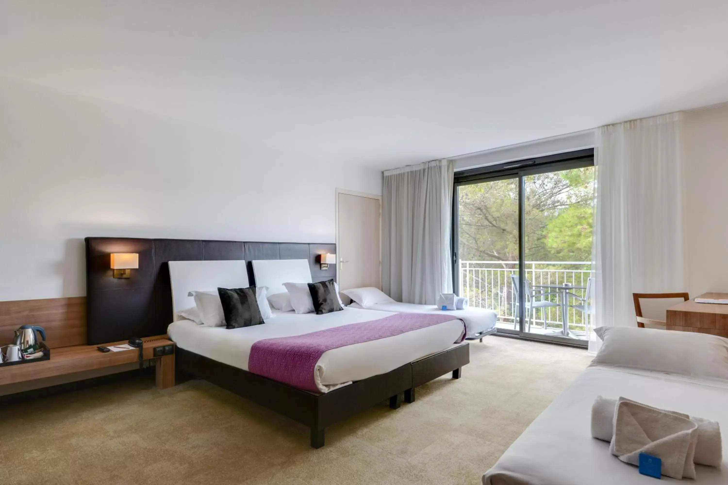 Bed in Mouratoglou Hotel & Resort