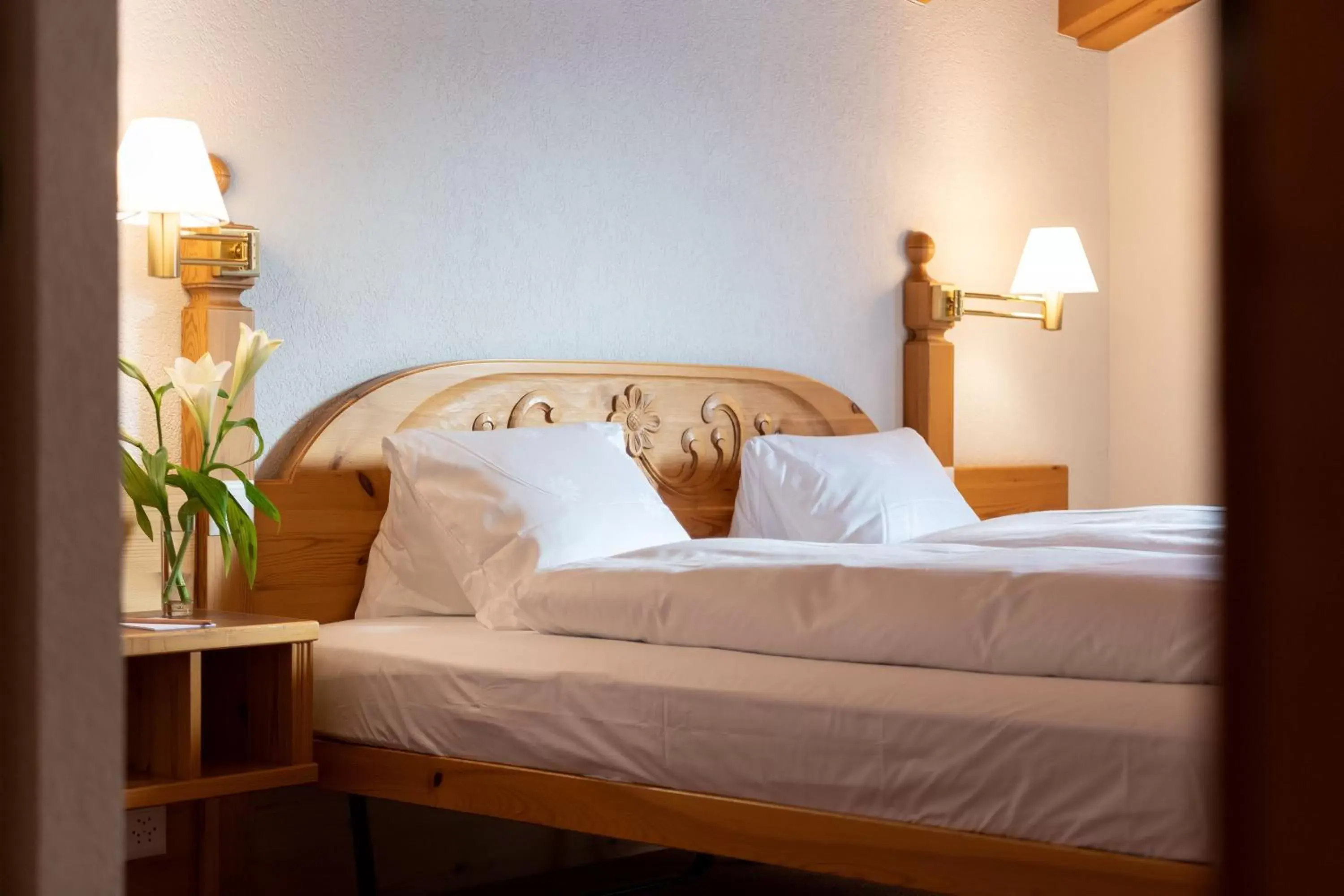 Bed in Sunstar Hotel & SPA Grindelwald