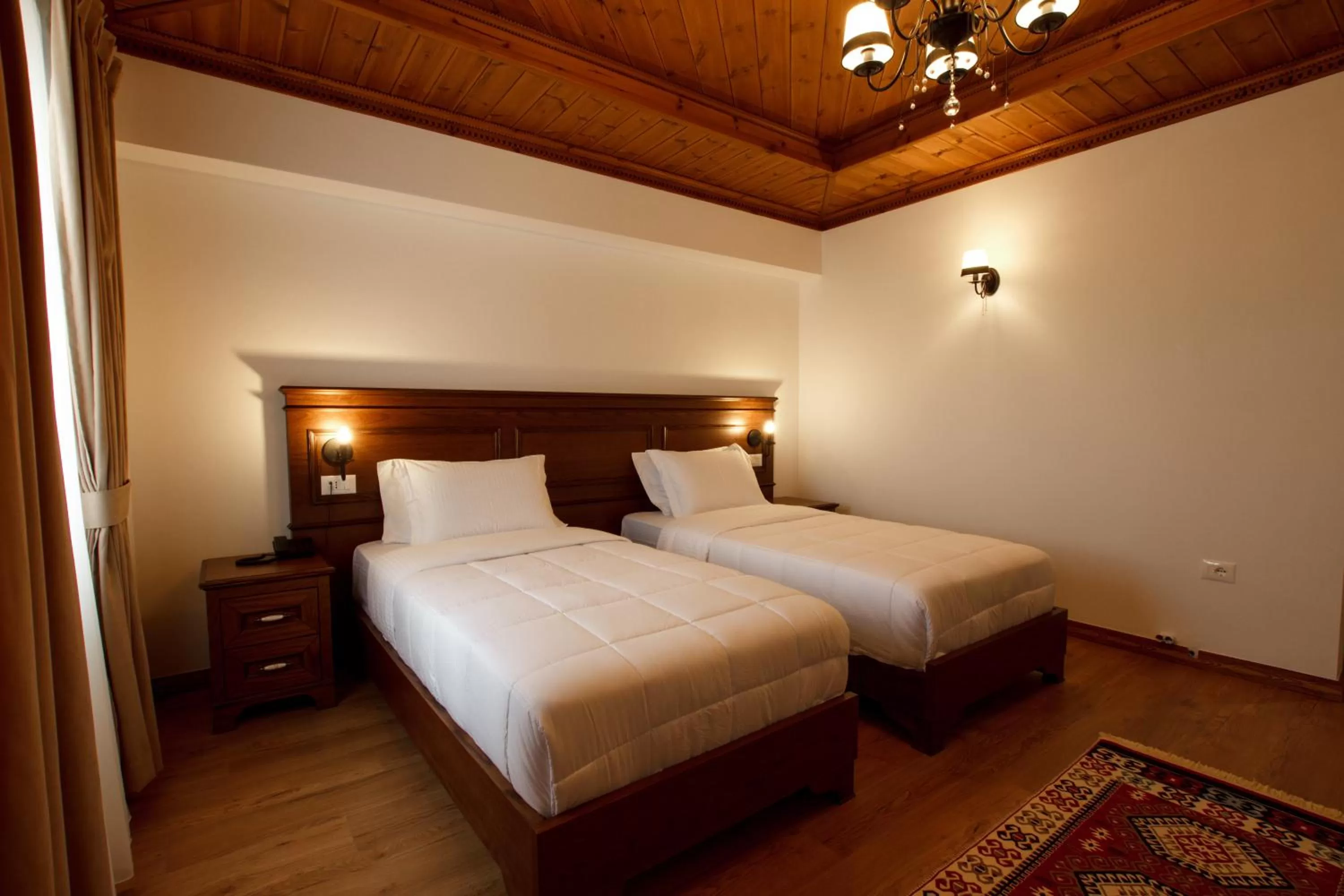 Bed in Rose Garden Hotel