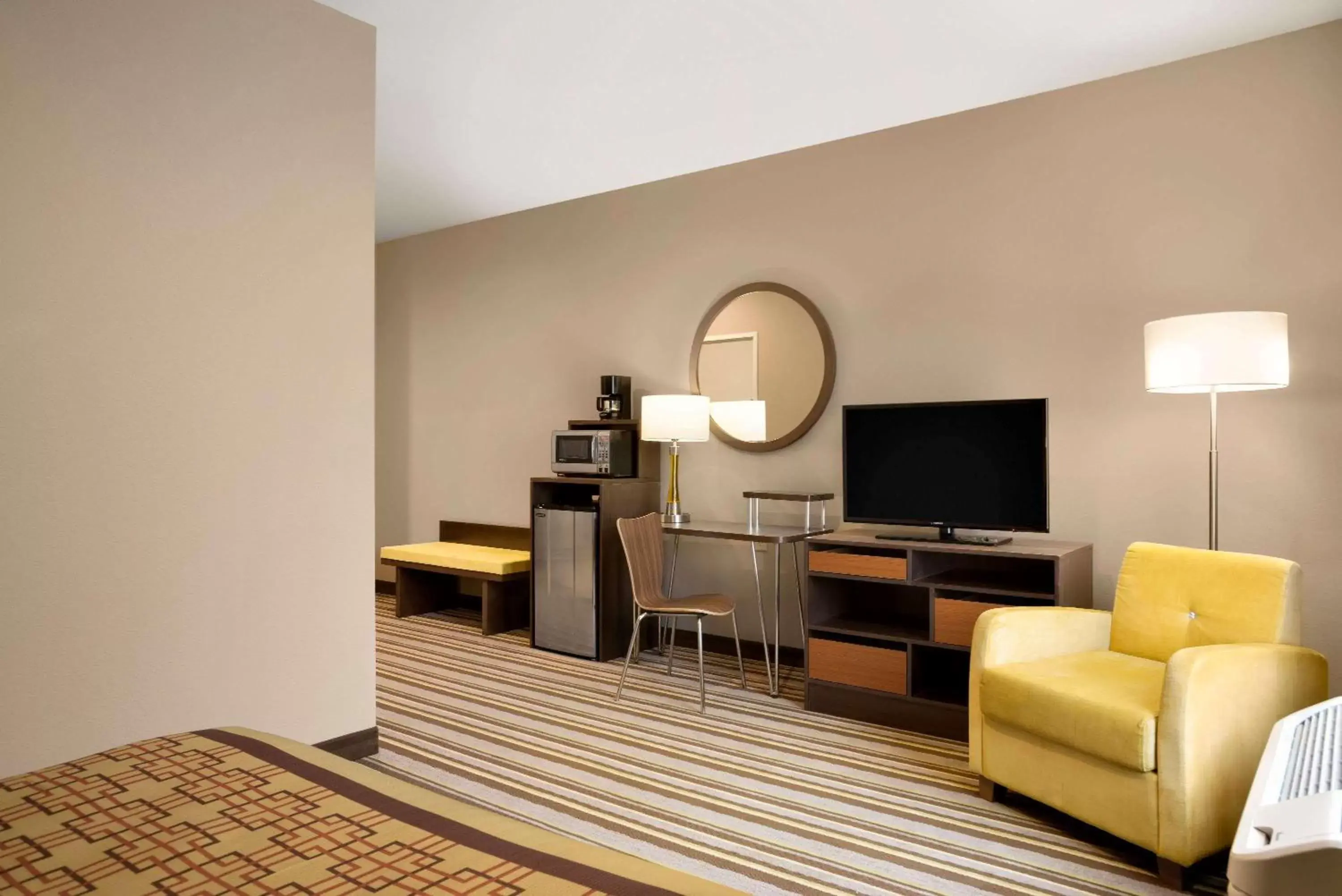 Photo of the whole room, TV/Entertainment Center in Super 8 by Wyndham Hershey