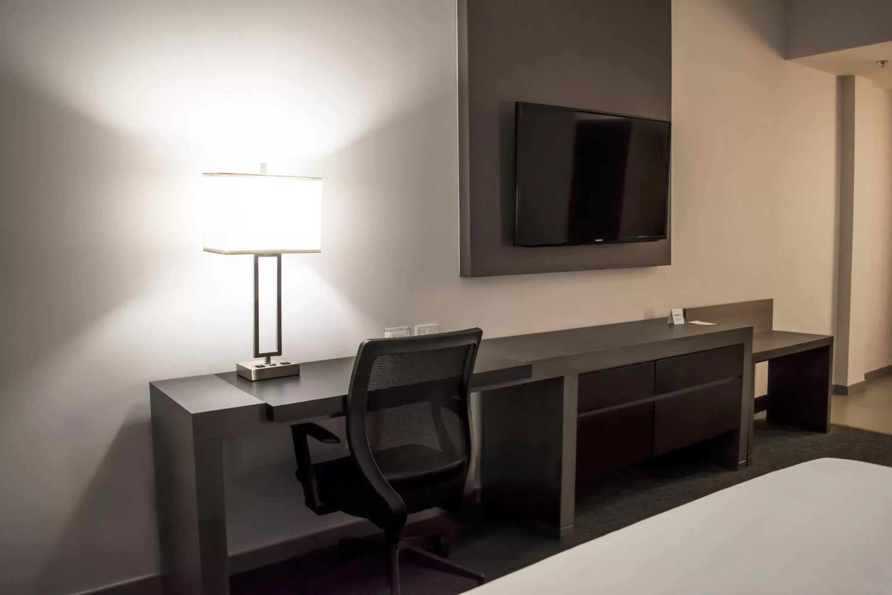 TV/Entertainment Center in Holiday Inn Express Hotel & Suites Hermosillo, an IHG Hotel