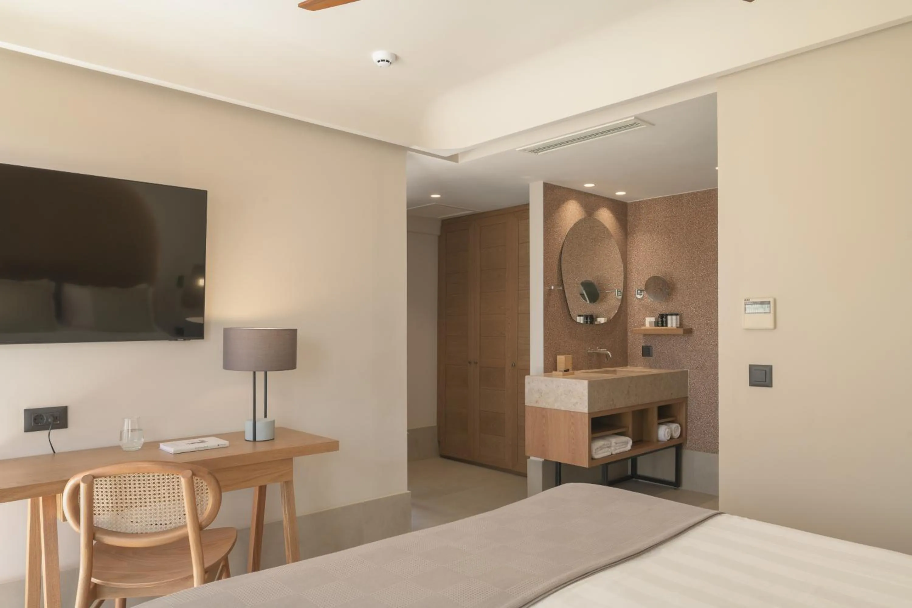 TV and multimedia, Bed in Paralos Venus Suites Adults Only