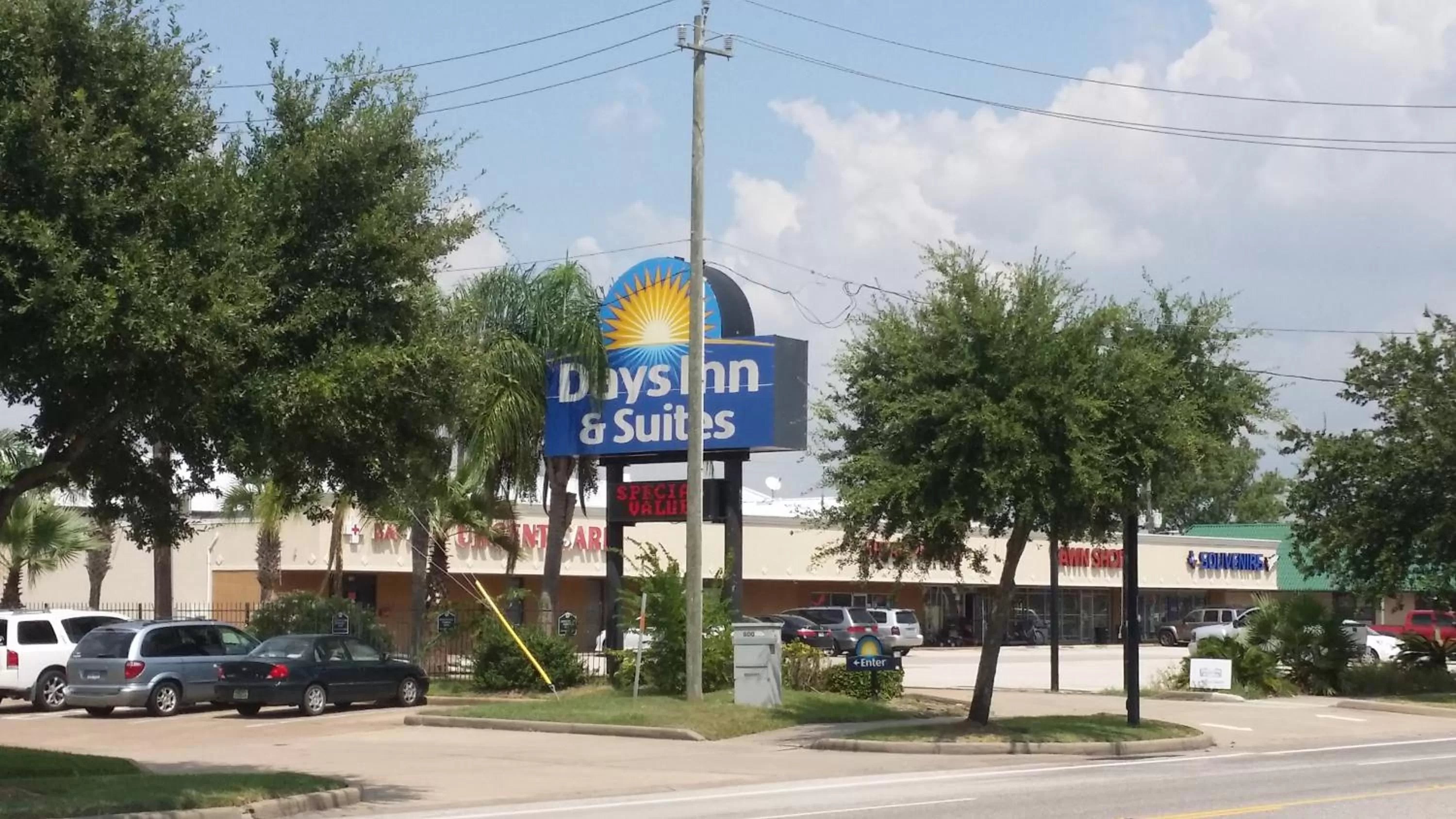 Property logo or sign in Days Inn & Suites by Wyndham Webster NASA-ClearLake-Houston