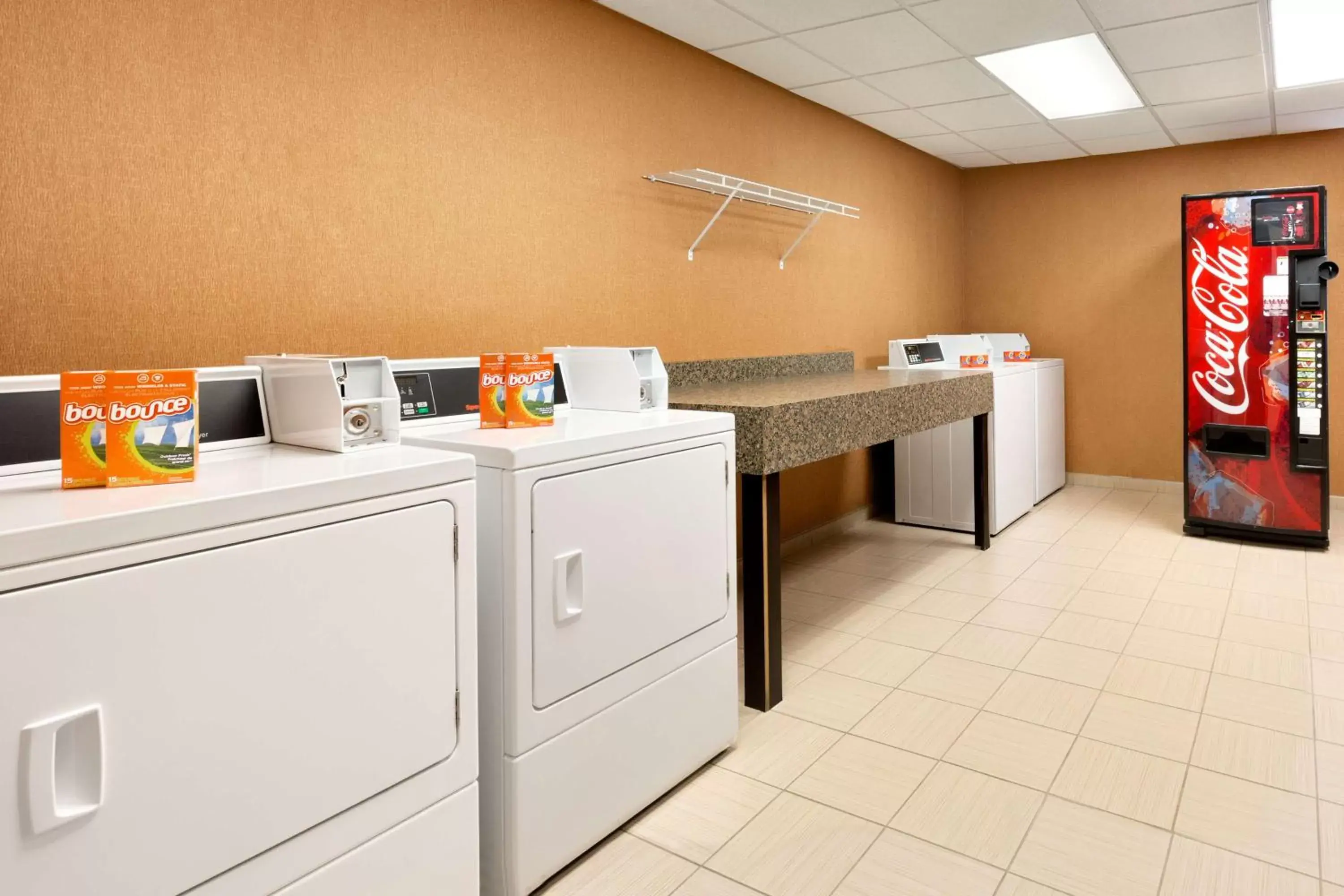 Property building, Kitchen/Kitchenette in Homewood Suites Fort Myers Airport - FGCU