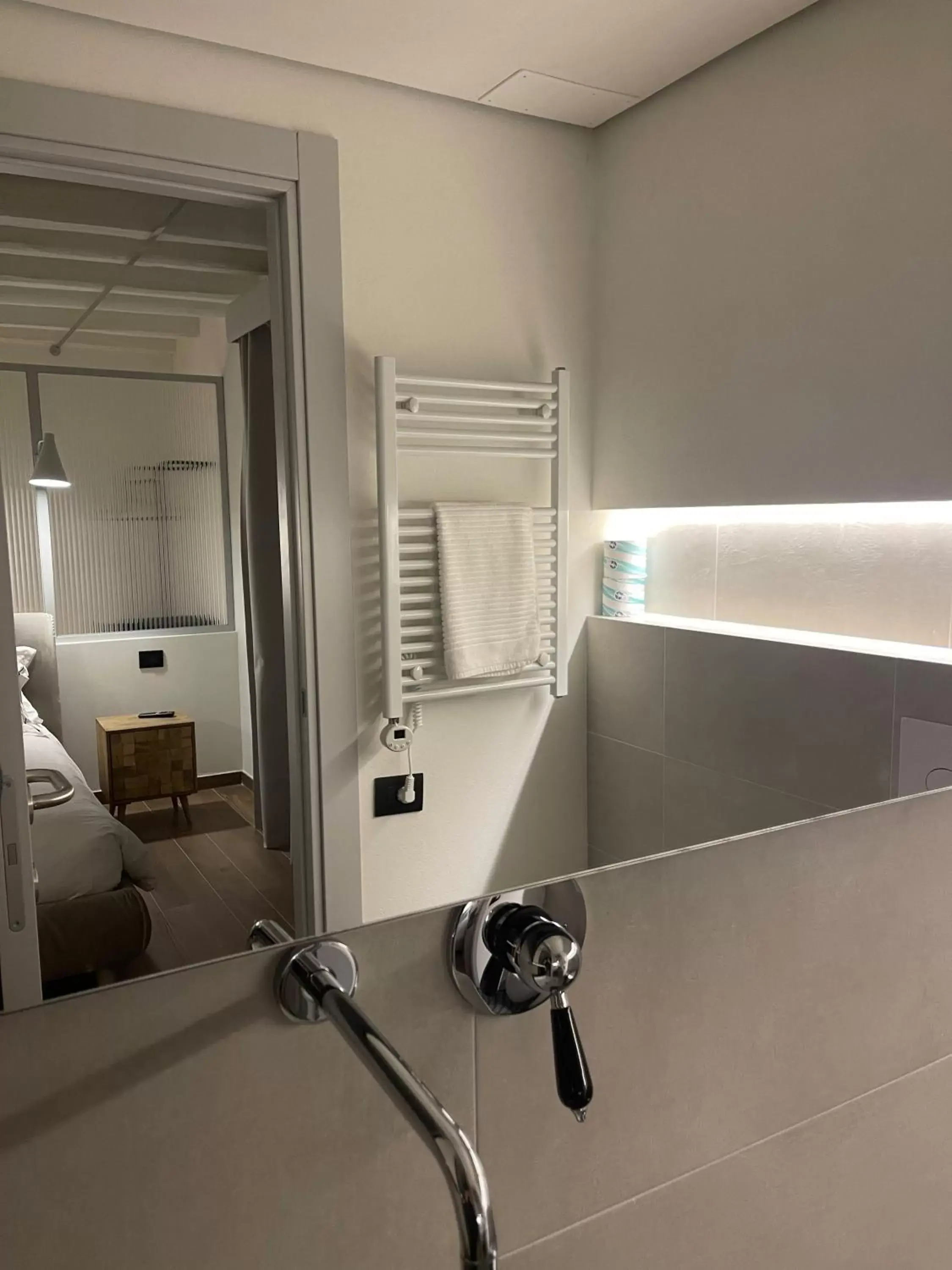 Bathroom in Raha Suites