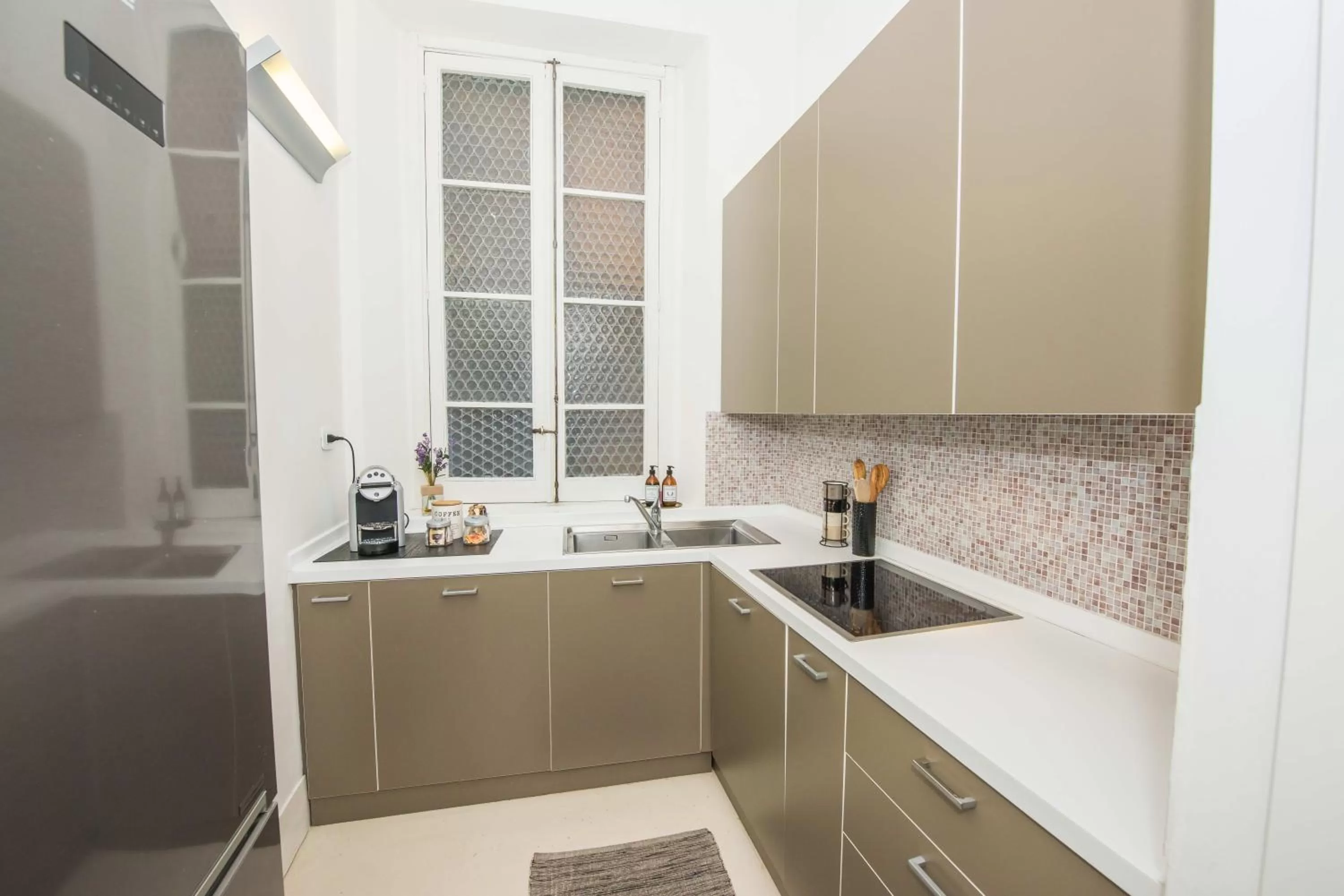 Kitchen or kitchenette in Piazza di Spagna 9