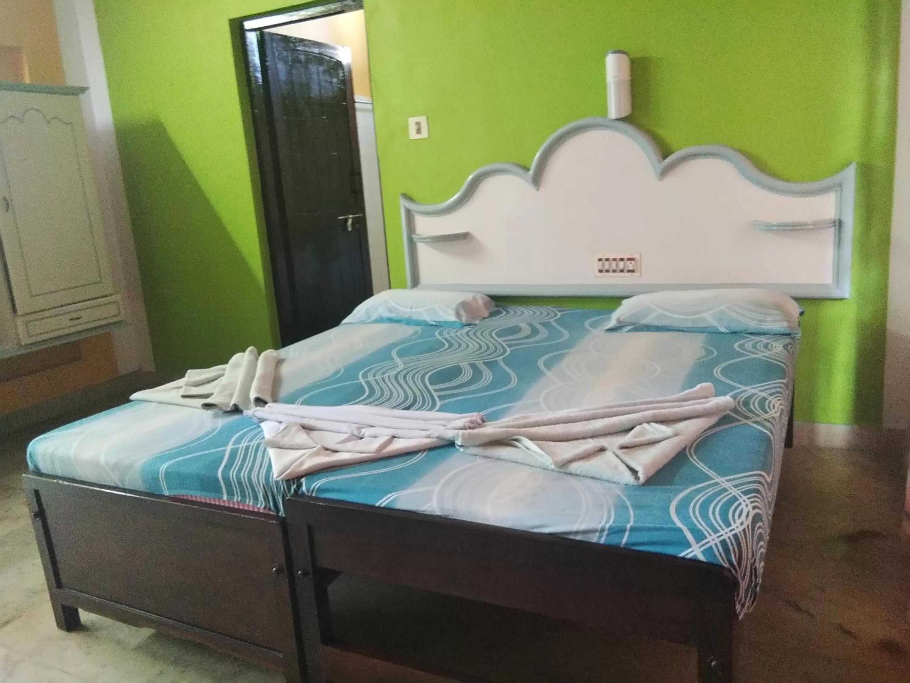 Bed in Wilson Ayurvedic Beach Resorts