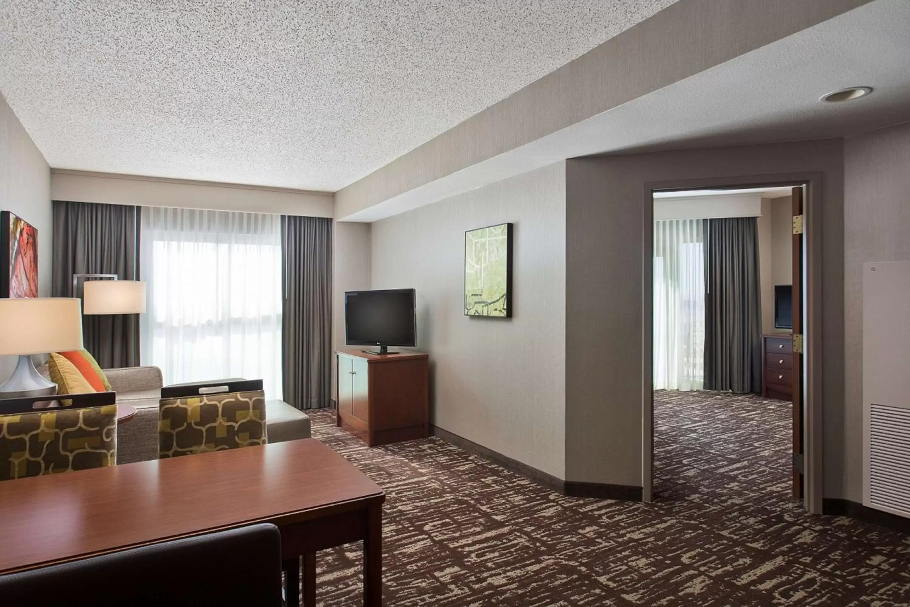 Bedroom, TV/Entertainment Center in Embassy Suites by Hilton Dallas Frisco Hotel & Convention Center