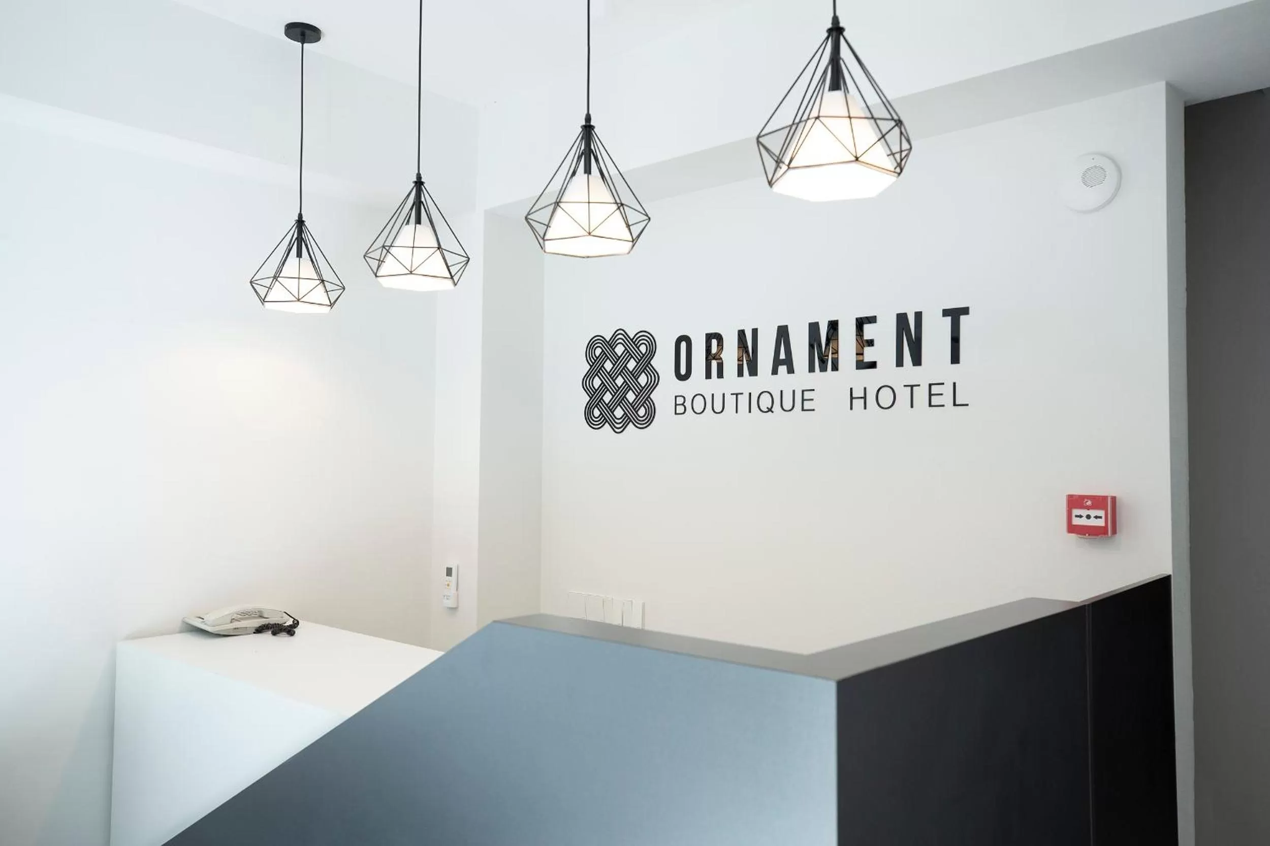 Property logo or sign in Ornament Boutique Hotel