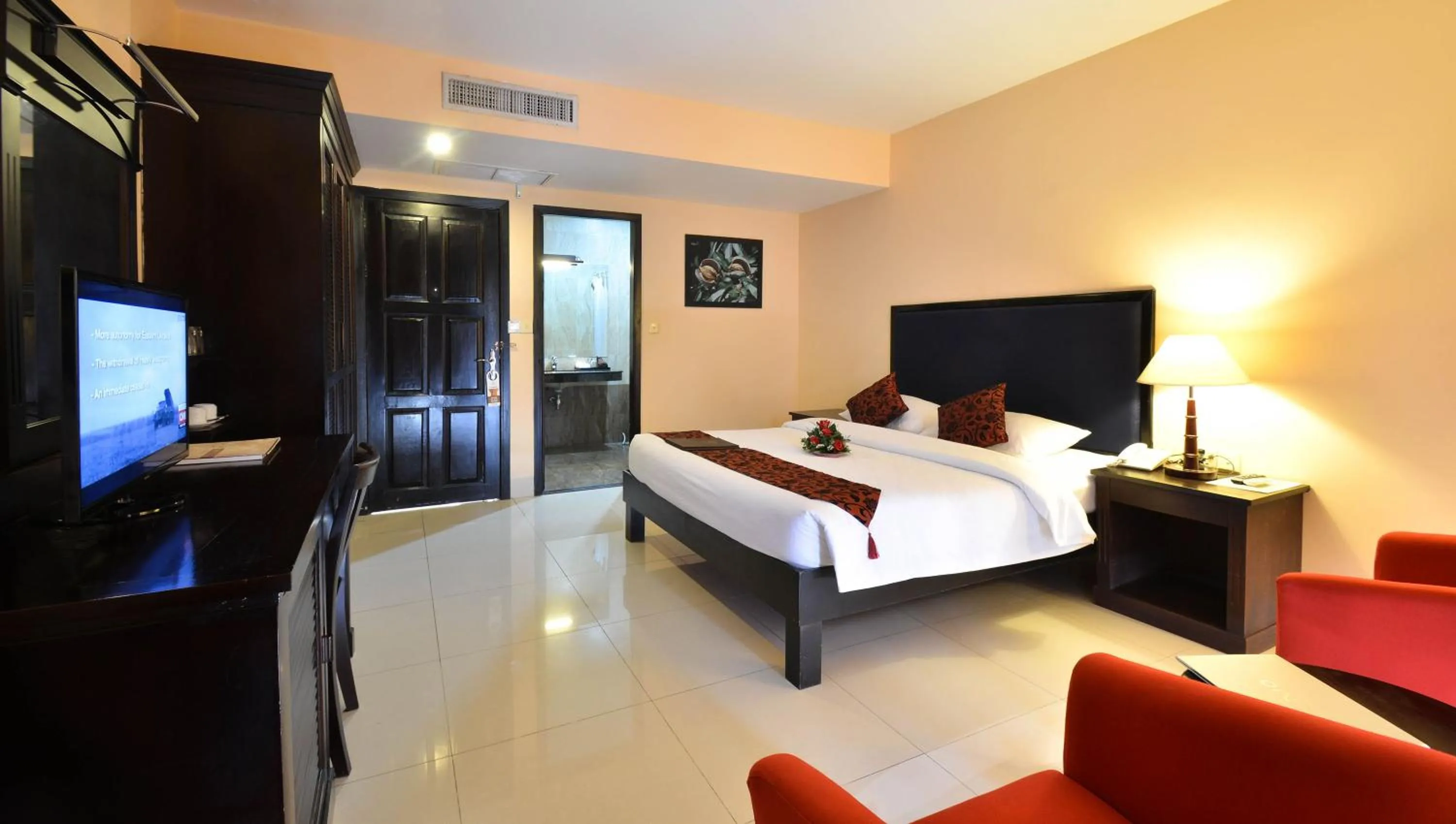 Toilet, Bed in Almond Hotel Sothearos