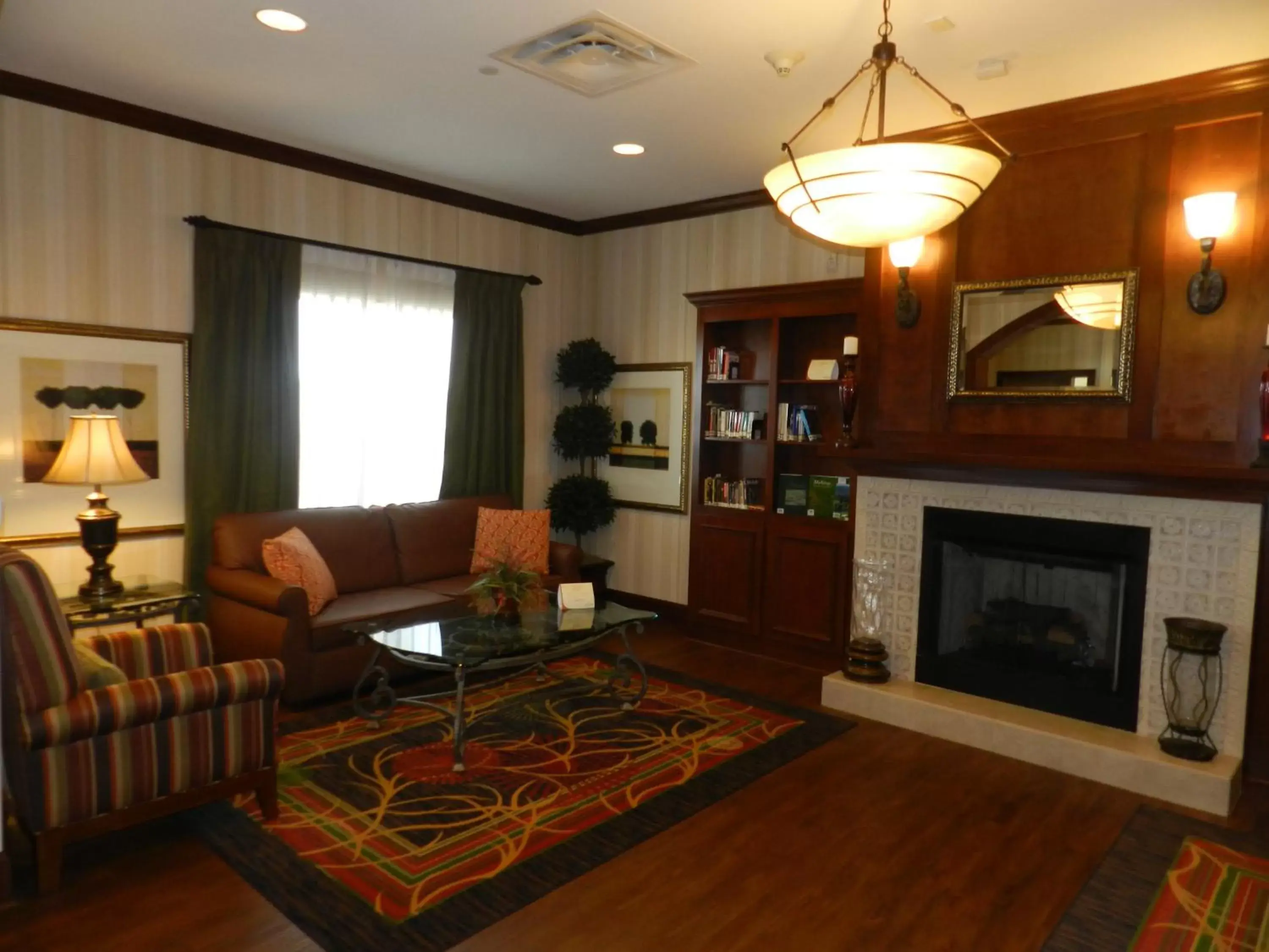 Library, Seating Area in Country Inn & Suites by Radisson, Braselton, GA