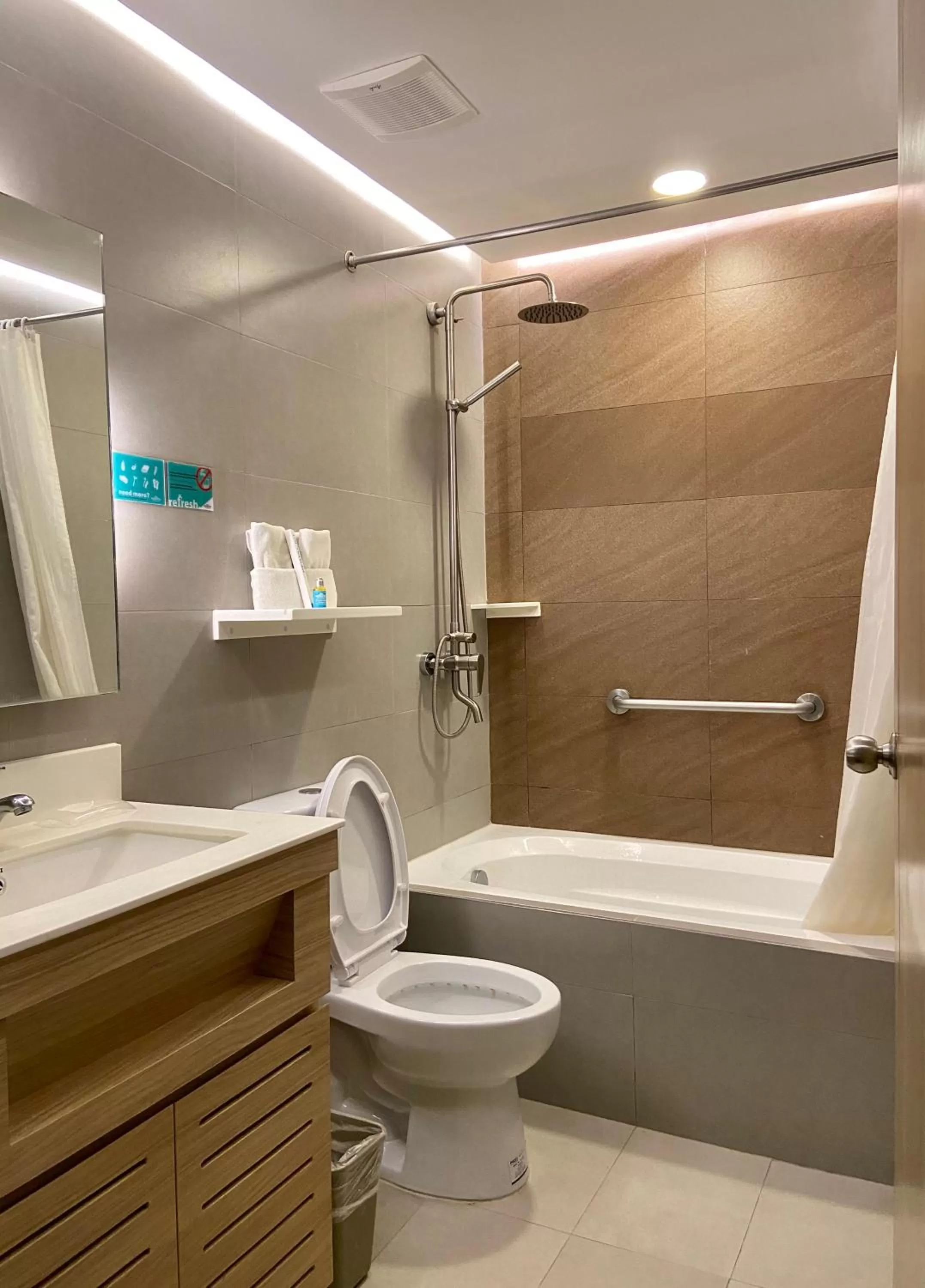 Toilet in Microtel by Wyndham Tarlac