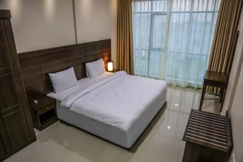 Bed in Barka Hotel Apartment