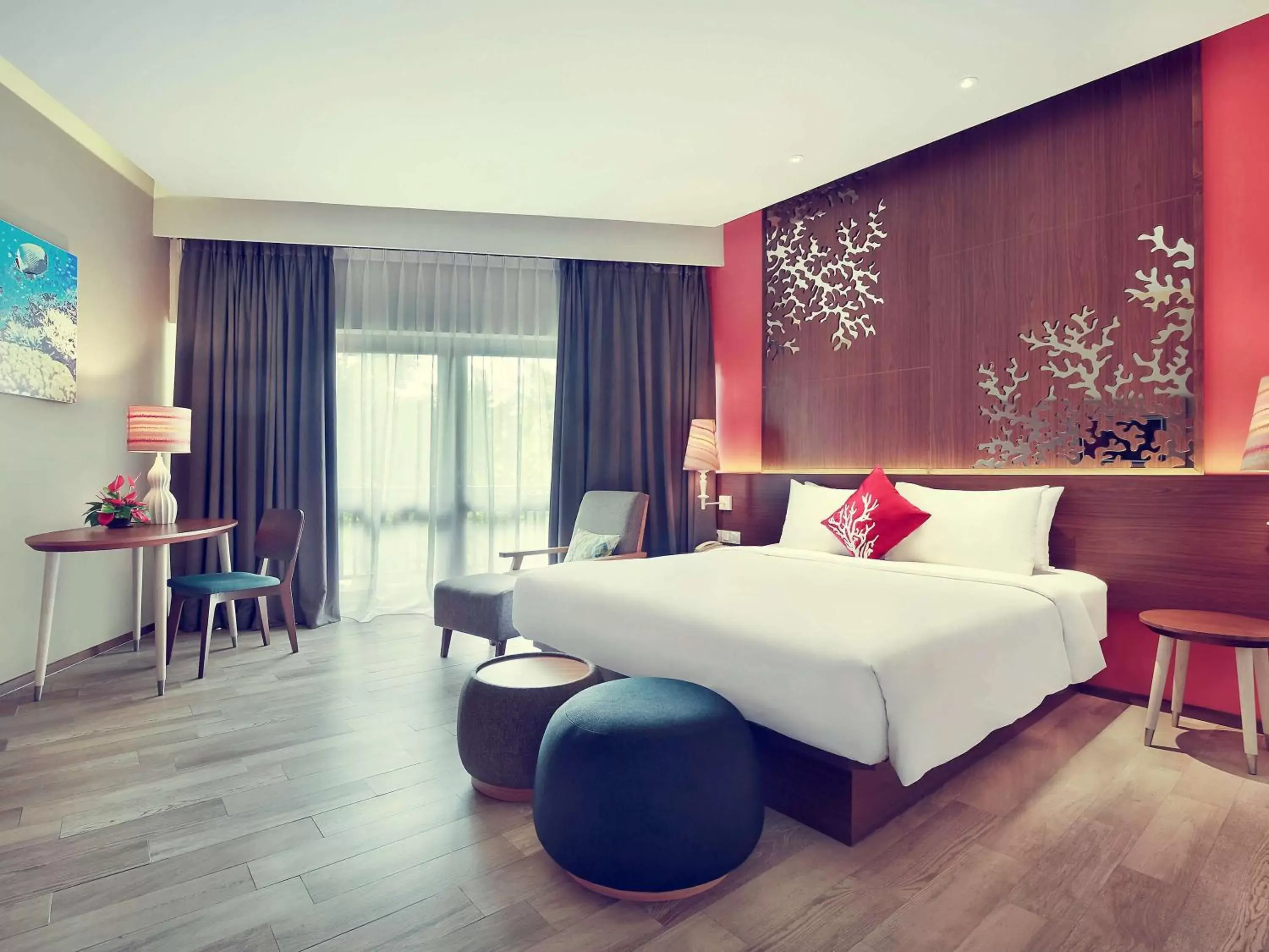 Photo of the whole room, Bed in Mercure Manado Tateli Resort and Convention