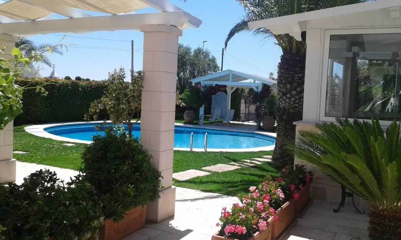 Property building, Swimming Pool in Villa Caramia