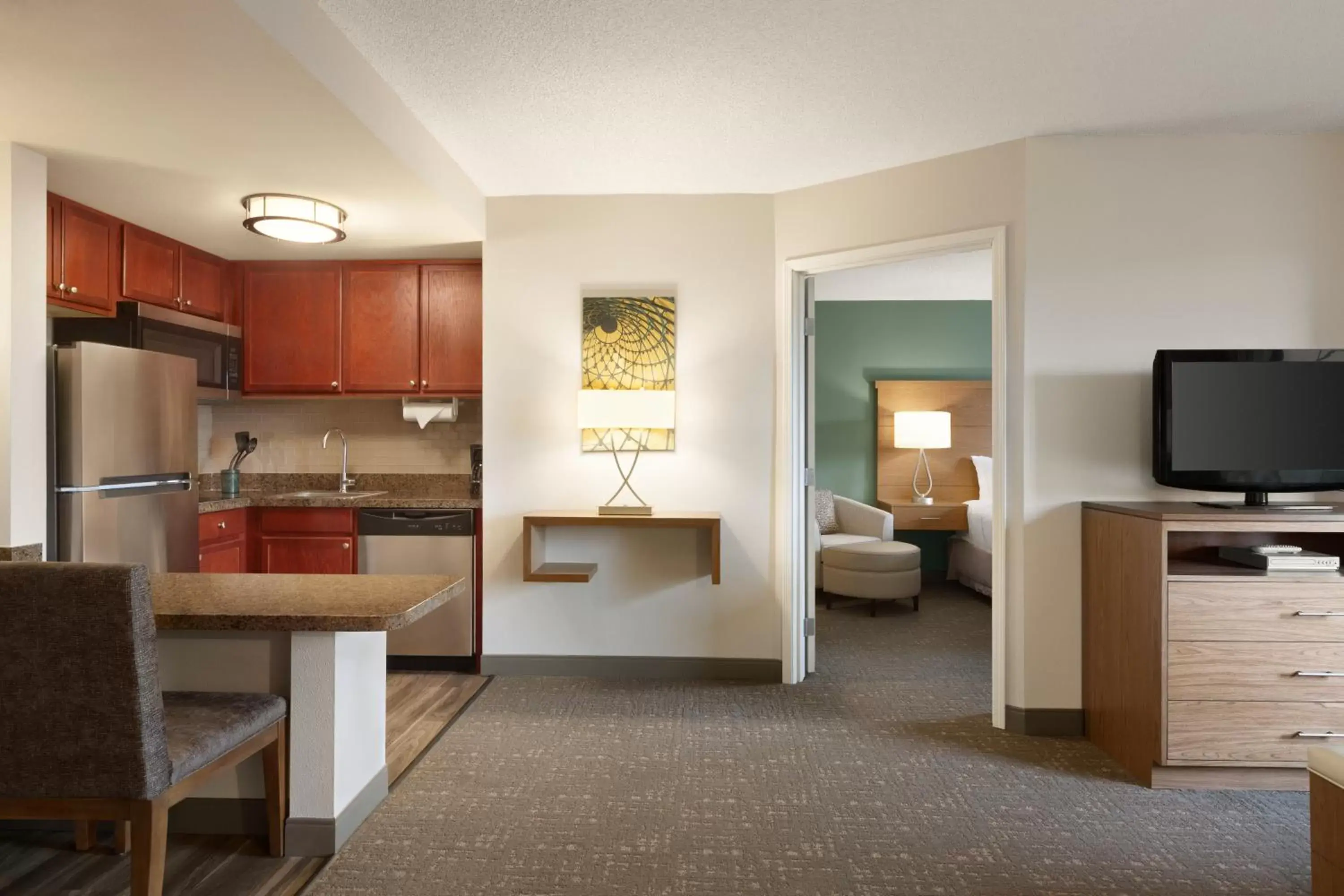 Photo of the whole room, Kitchen/Kitchenette in Staybridge Suites Tampa East- Brandon, an IHG Hotel