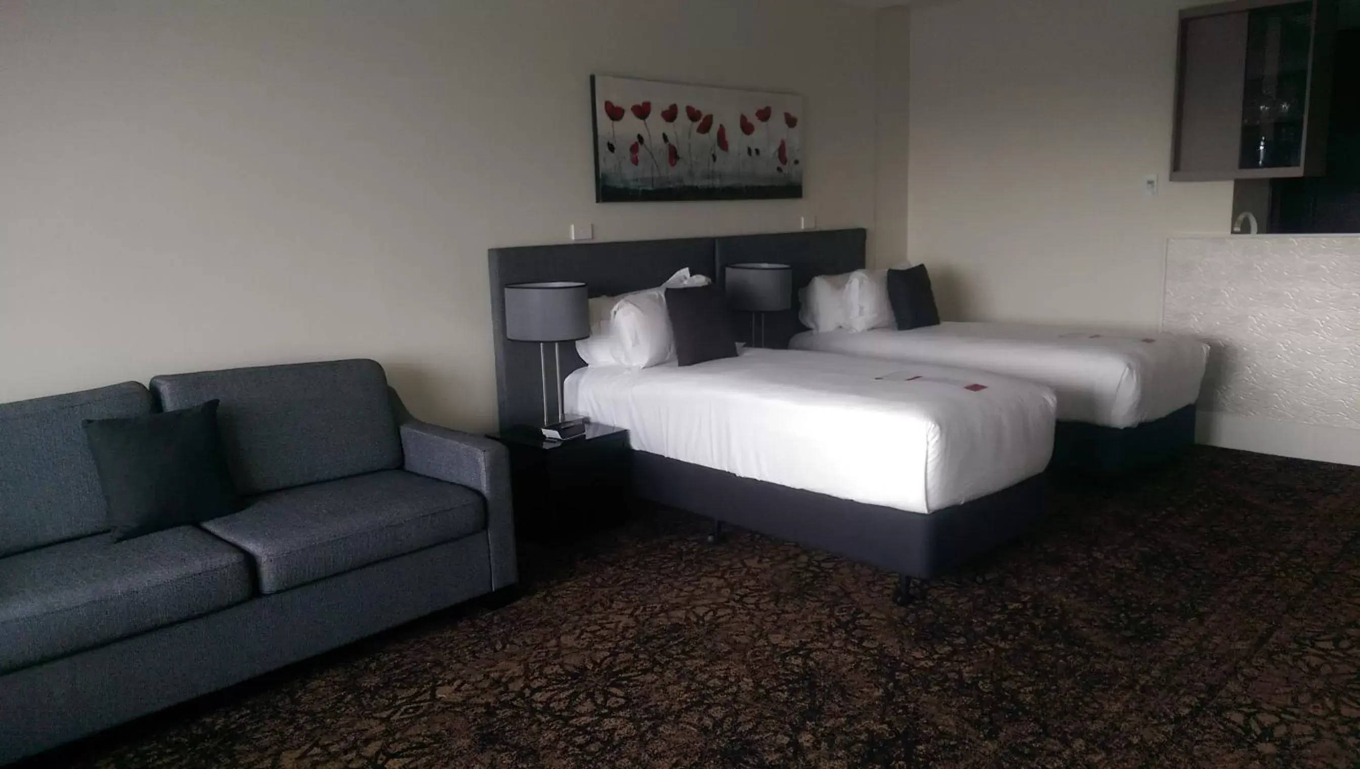 Photo of the whole room, Bed in Calamvale Hotel Suites and Conference Centre