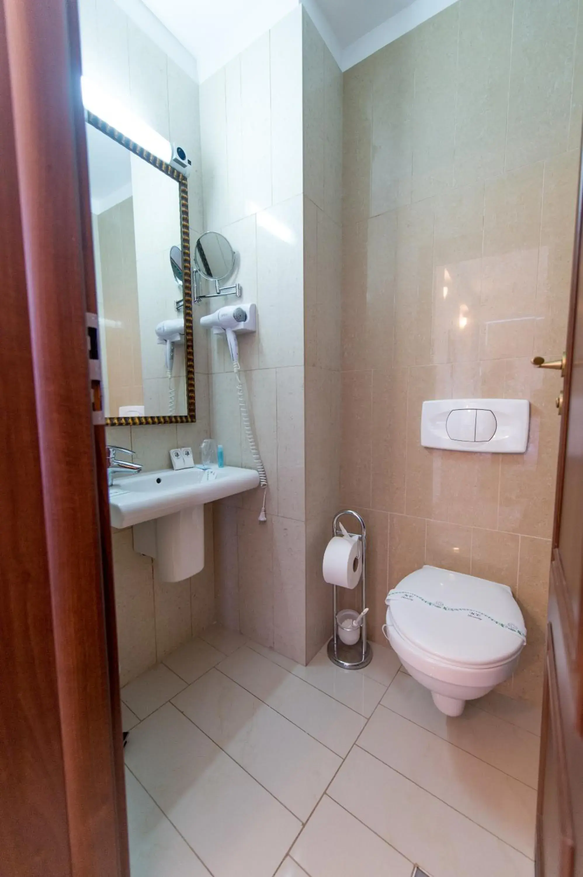 Toilet, Bathroom in Hotel Rexton