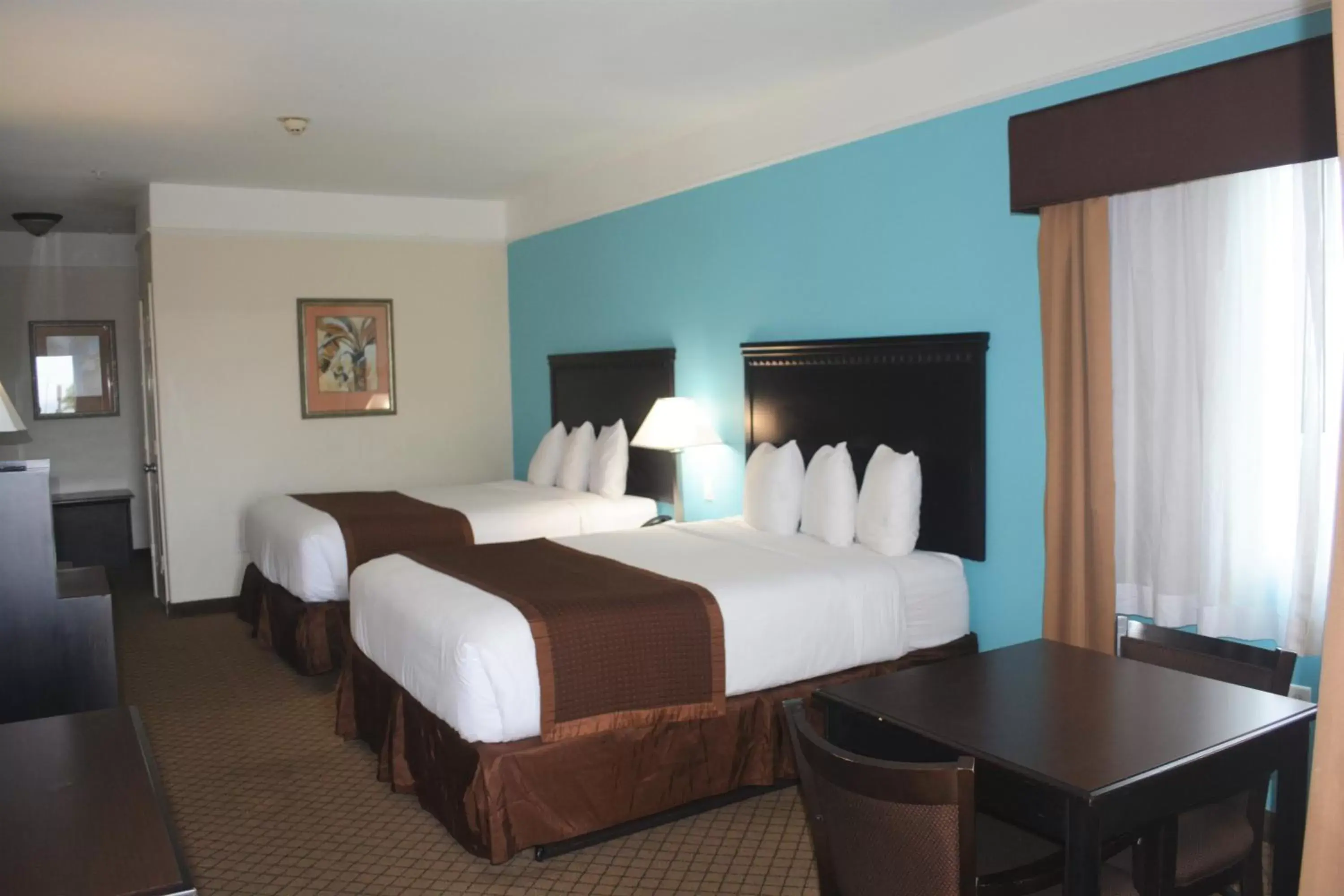 Photo of the whole room, Bed in Baymont by Wyndham Galveston