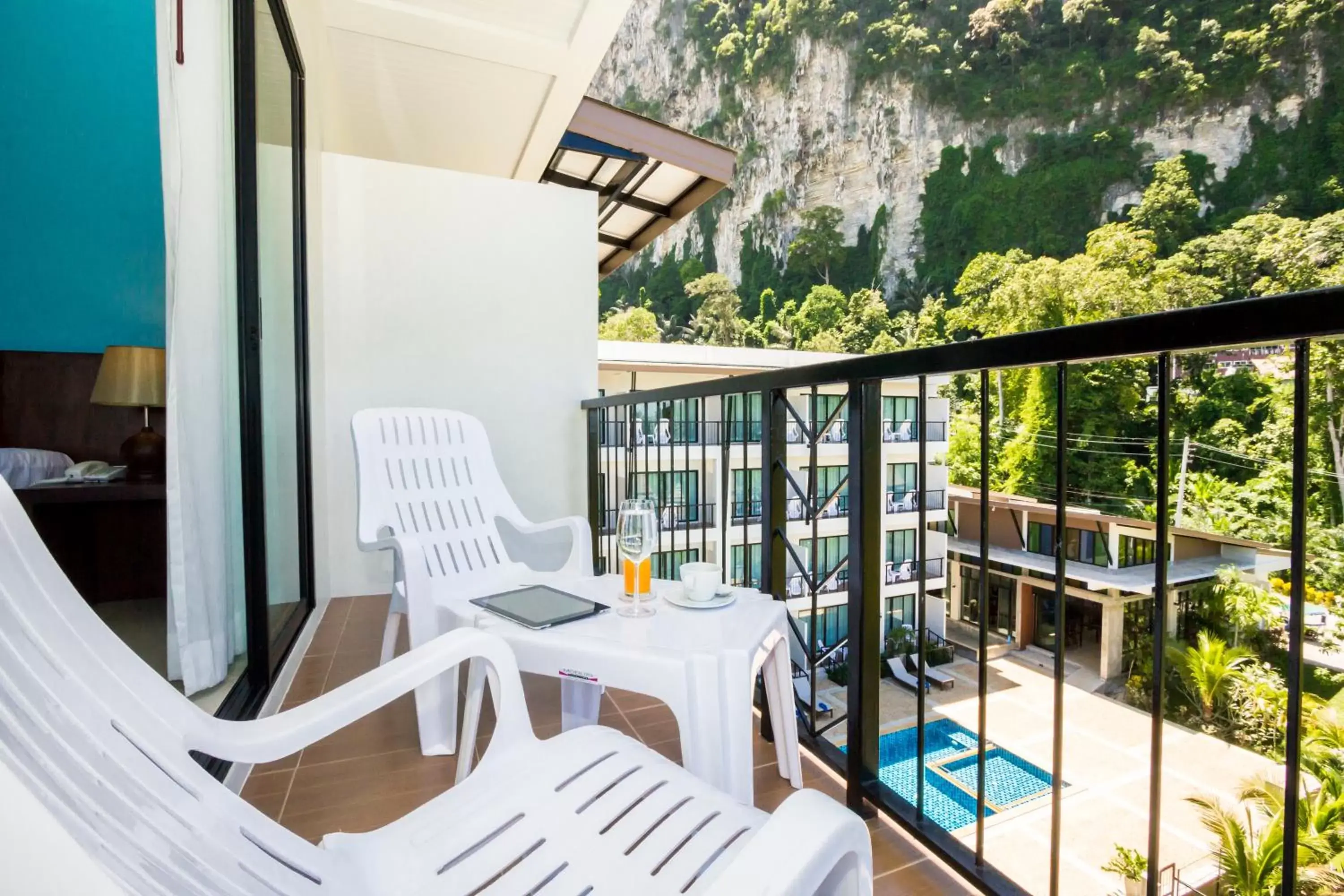 Swimming pool, Balcony/Terrace in Andaman Pearl Resort