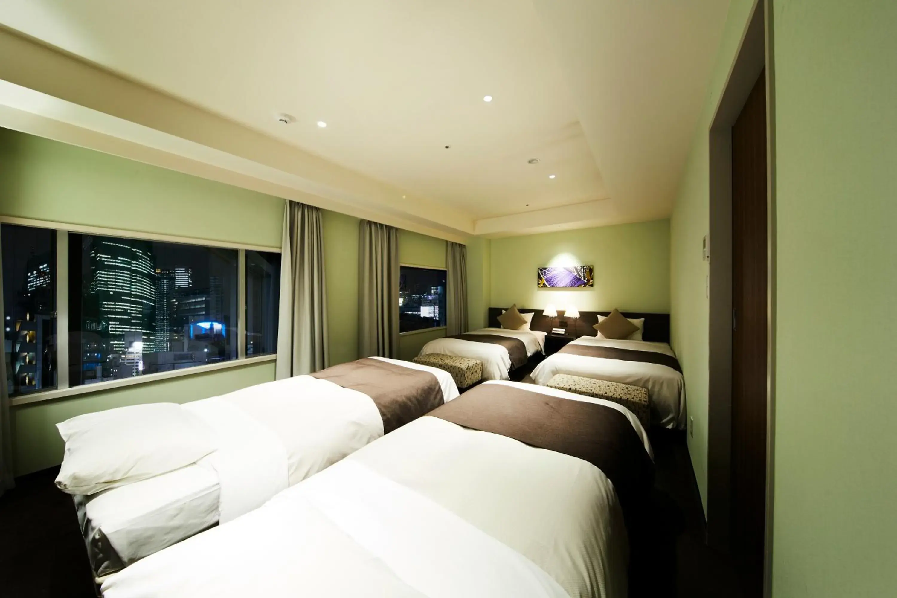 Bed in Ginza Grand Hotel