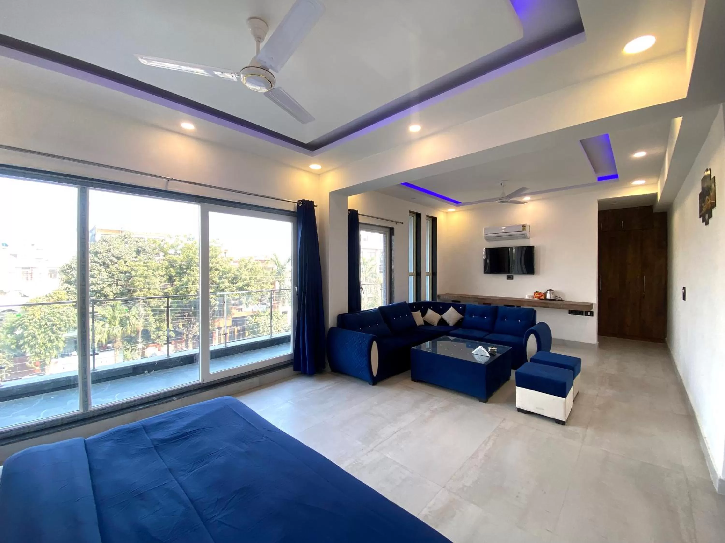 Bedroom, Seating Area in The Metro Stay By F9 Hotels-Near Sector 18 Metro Station Noida