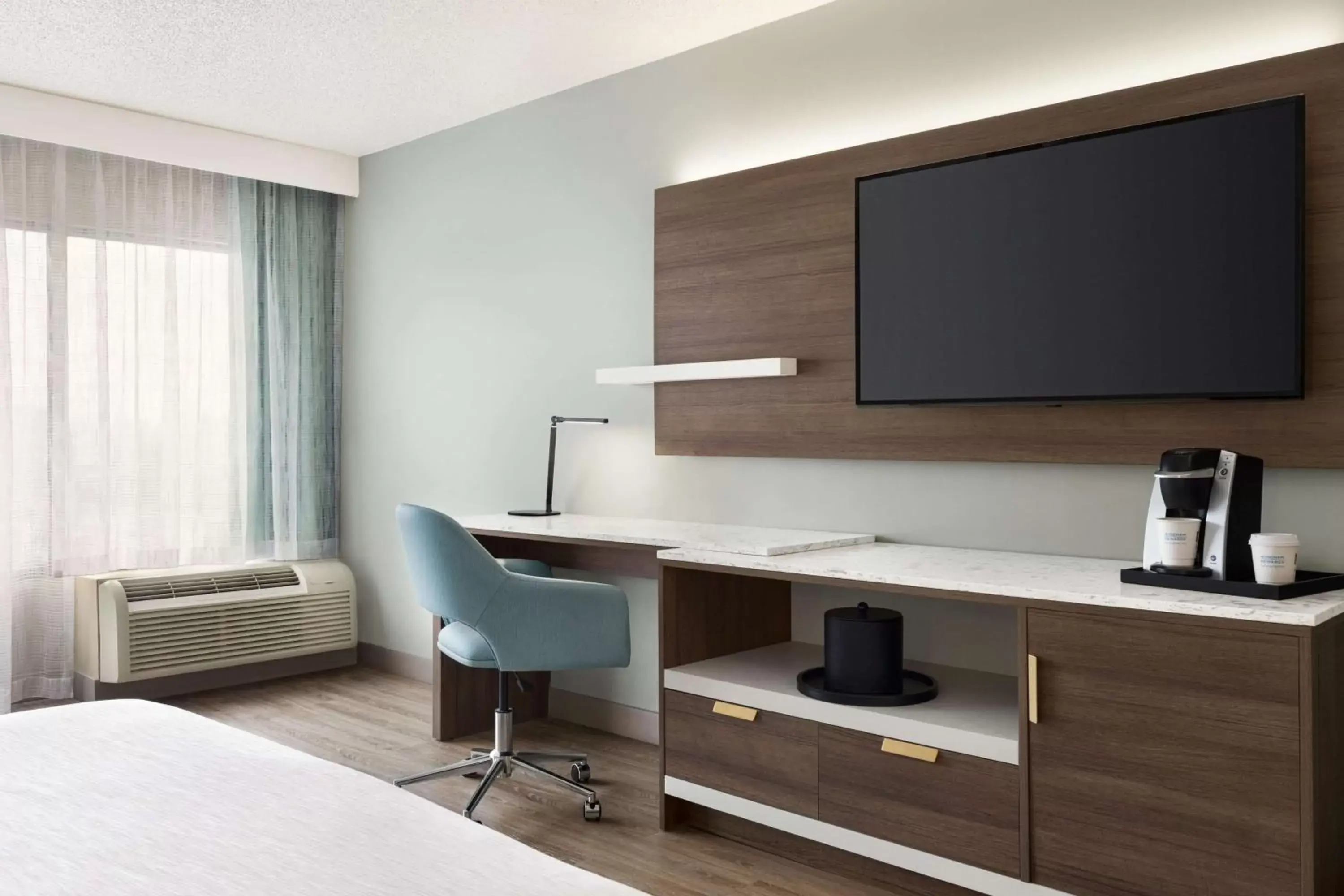 Bedroom, TV/Entertainment Center in Wyndham Garden Totowa