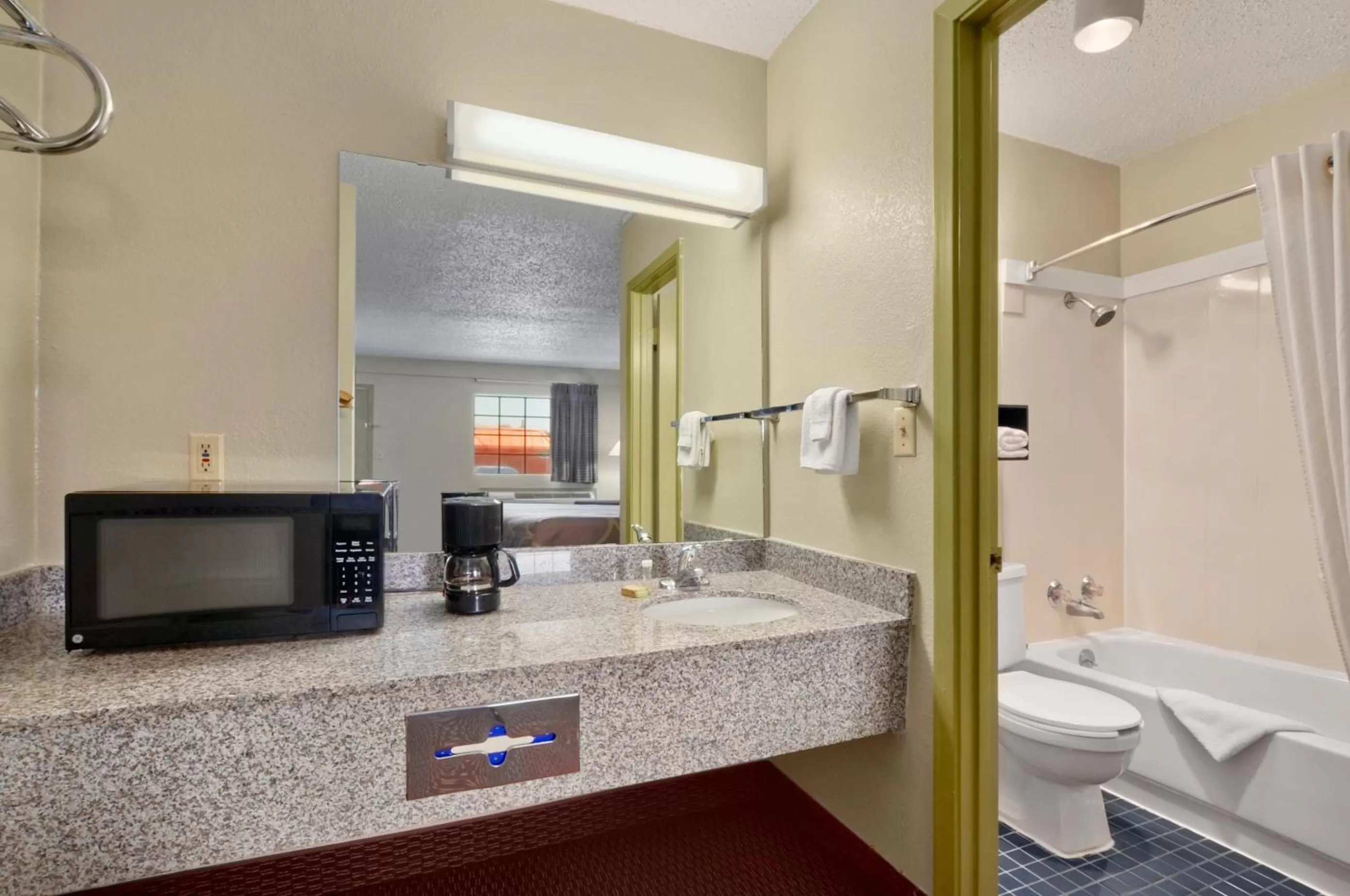 Bathroom in Super 8 by Wyndham Monticello AR