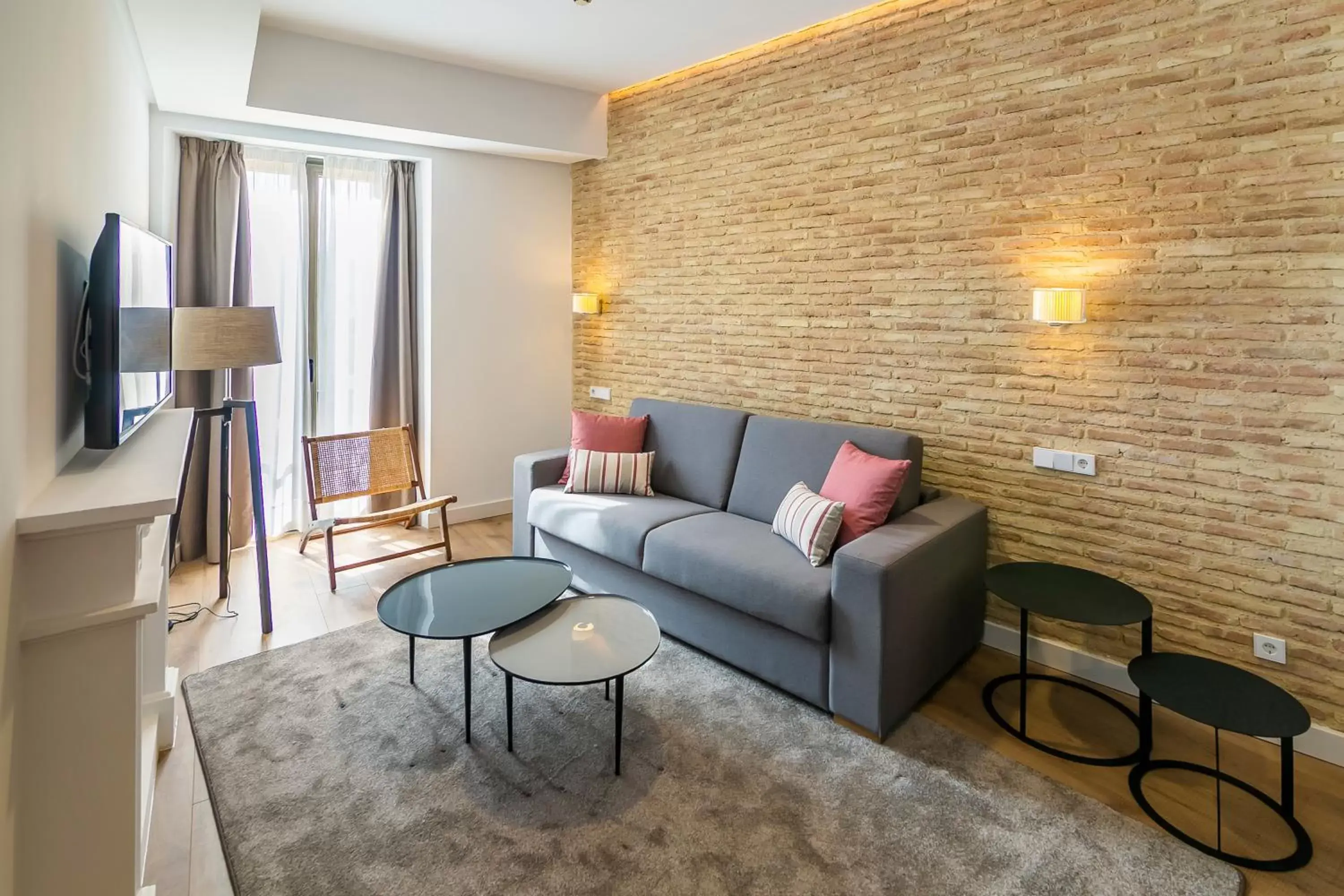 TV and multimedia, Seating Area in Aquitania Home Suites