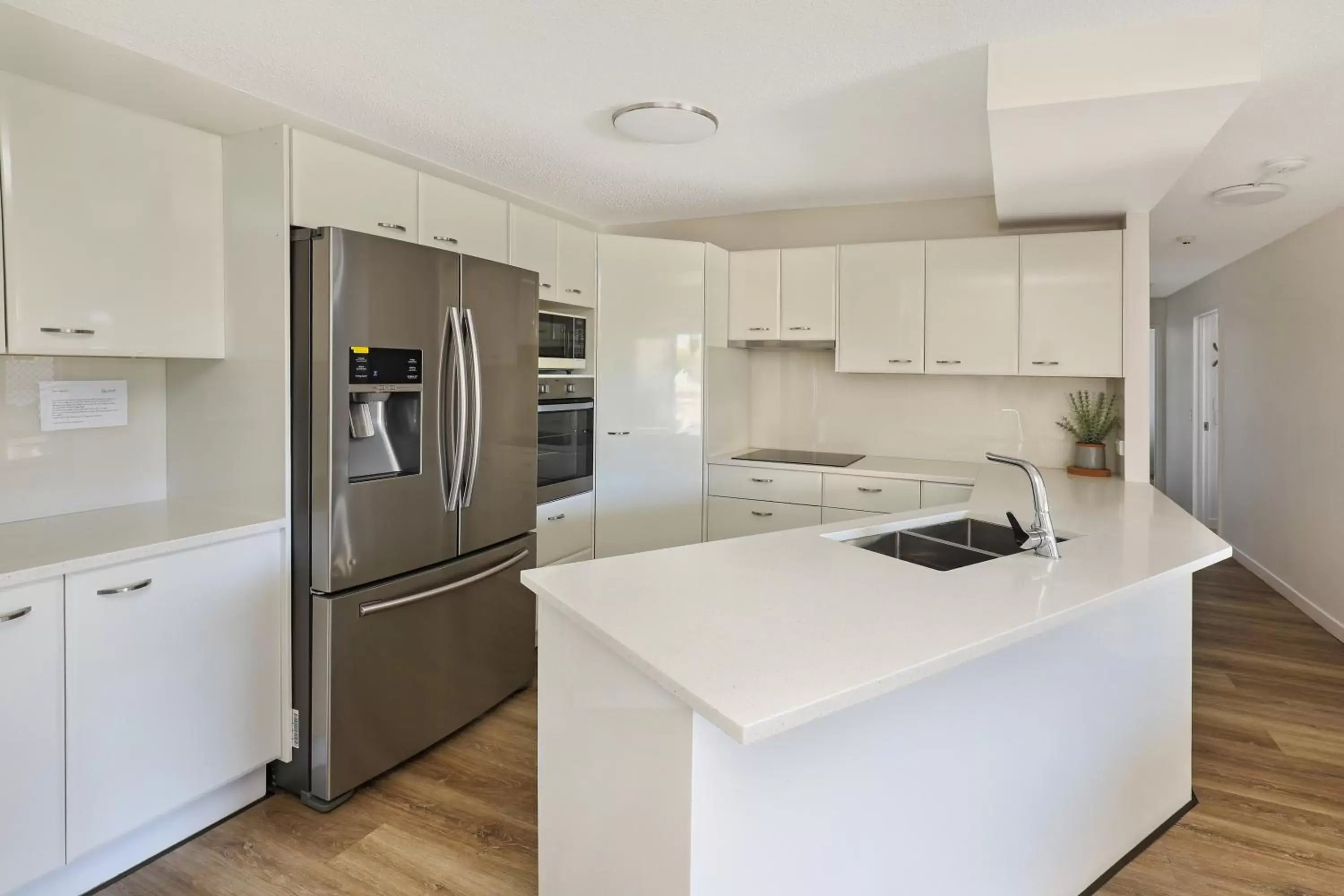 Kitchen/Kitchenette in Beachside Resort Kawana Waters