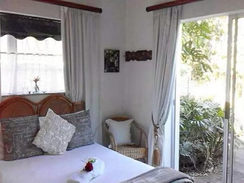 Bed in Forword's River Lodge