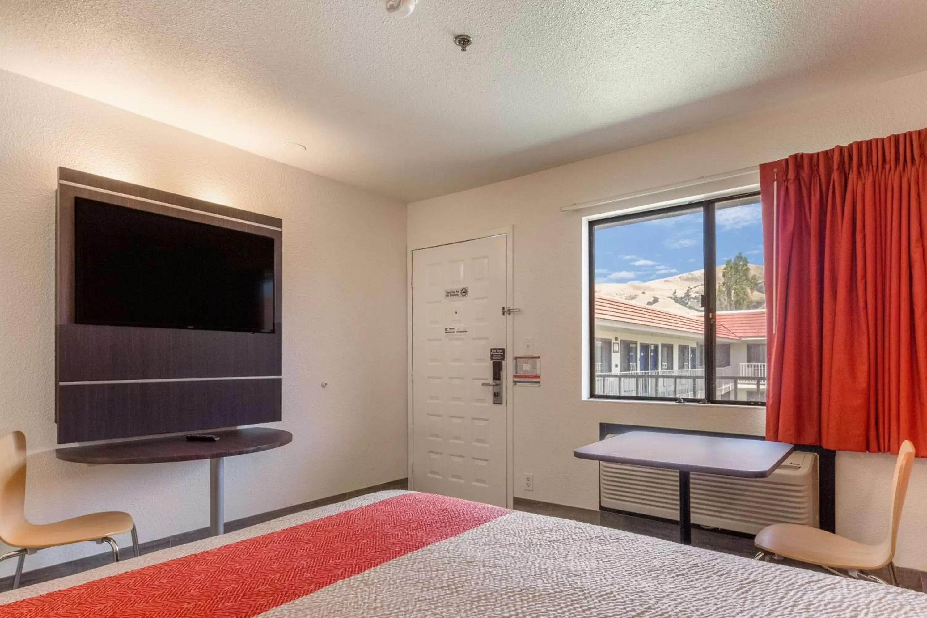 Photo of the whole room, TV/Entertainment Center in Motel 6-Fremont, CA - South