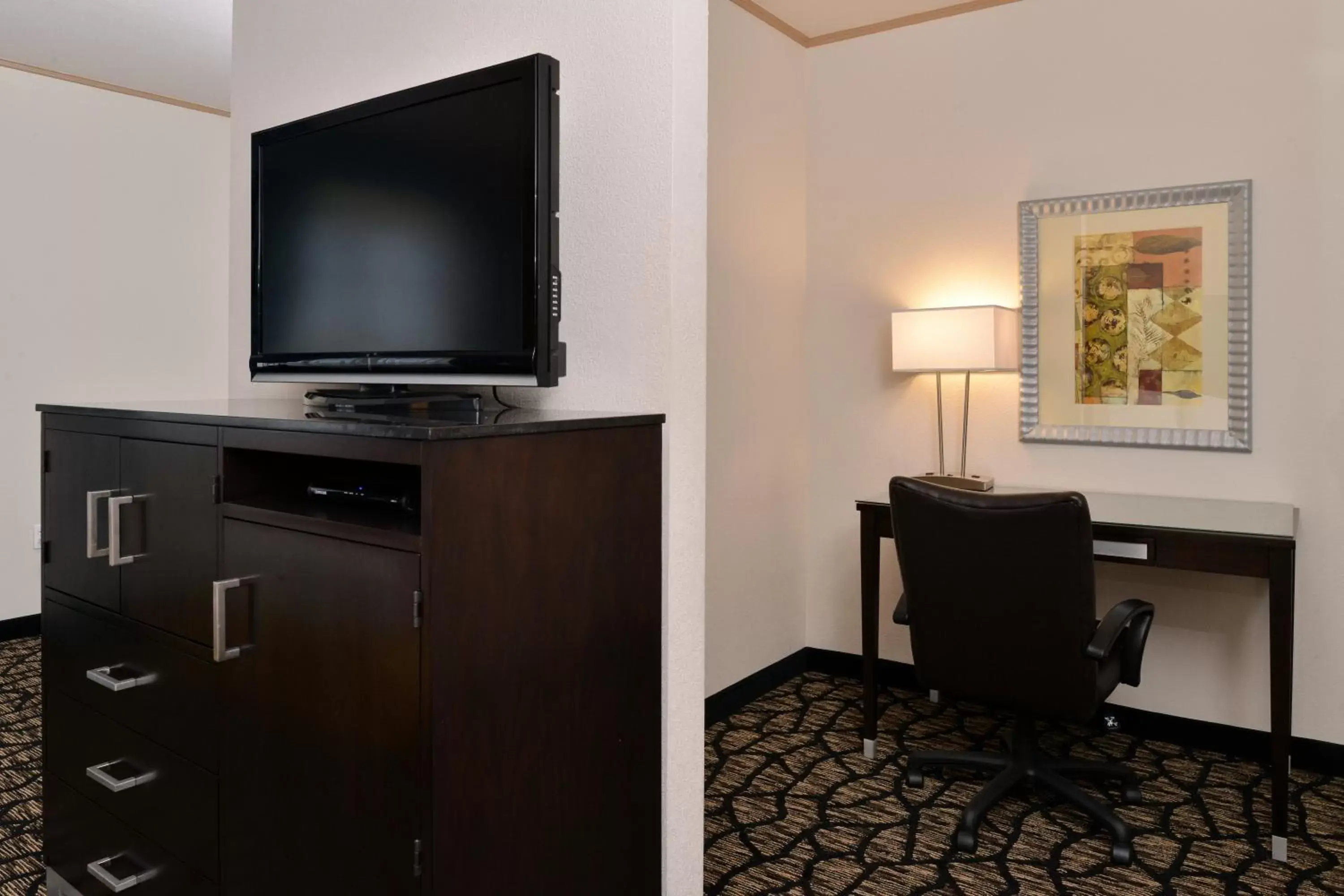 Photo of the whole room, TV/Entertainment Center in Holiday Inn Express Hotel & Suites Tacoma South - Lakewood, an IHG Hotel