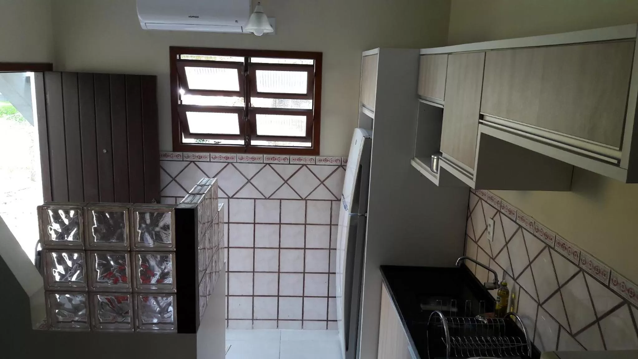 Kitchen or kitchenette in Casa da Marilú